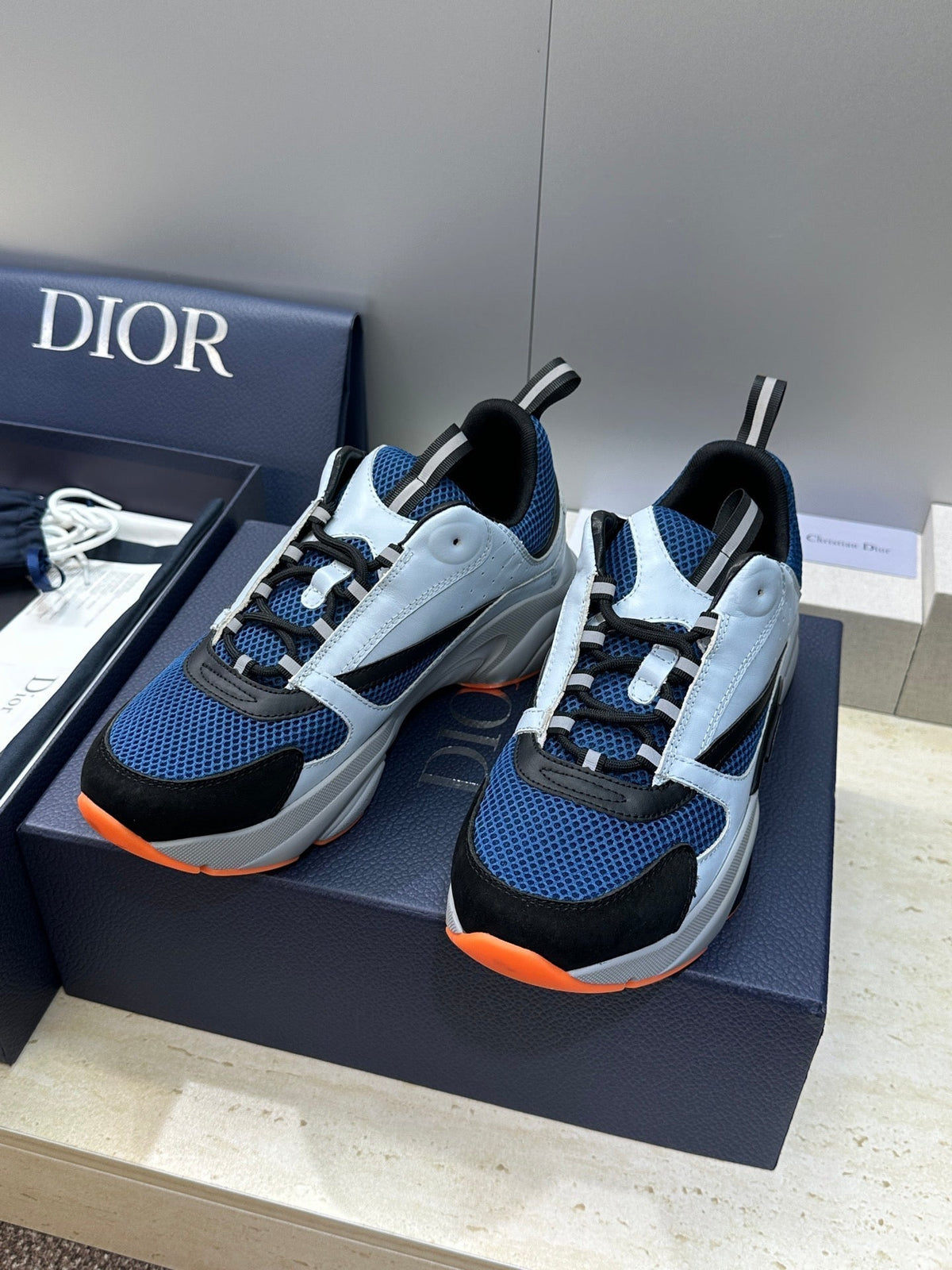 CD 26s Men B22 Sneakers Light Blue Mesh Orange Sole 814925