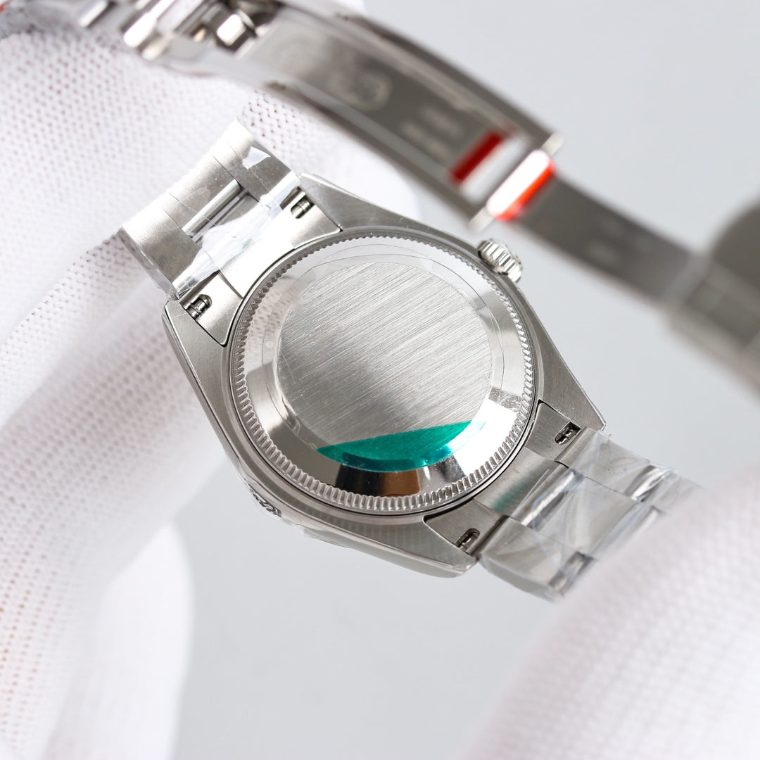 OYSTER PERPETUAL 31MM GREEN DIAL