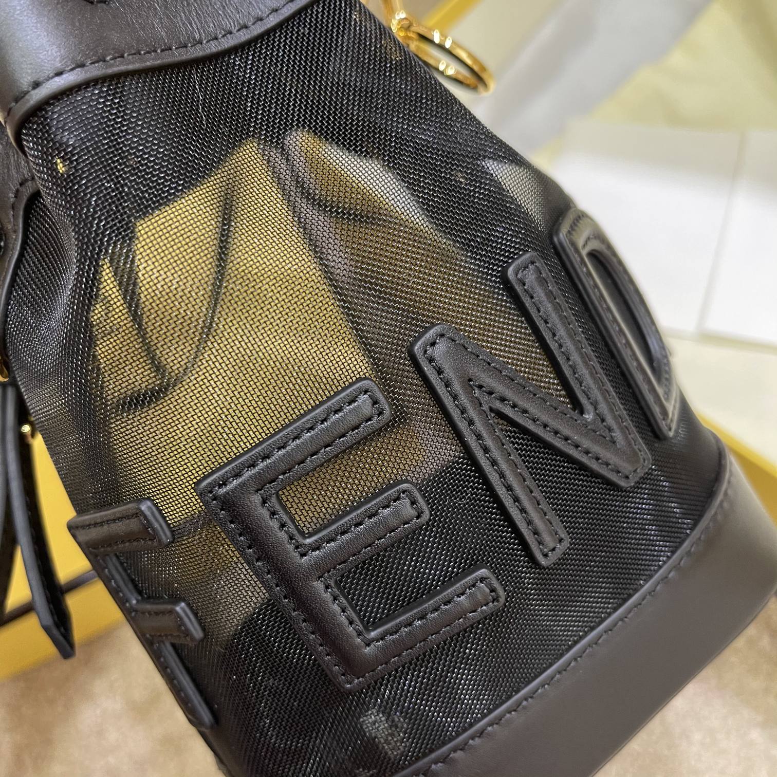 MON TRESOR 18 IN BLACK CALFSKIN AND MESH
