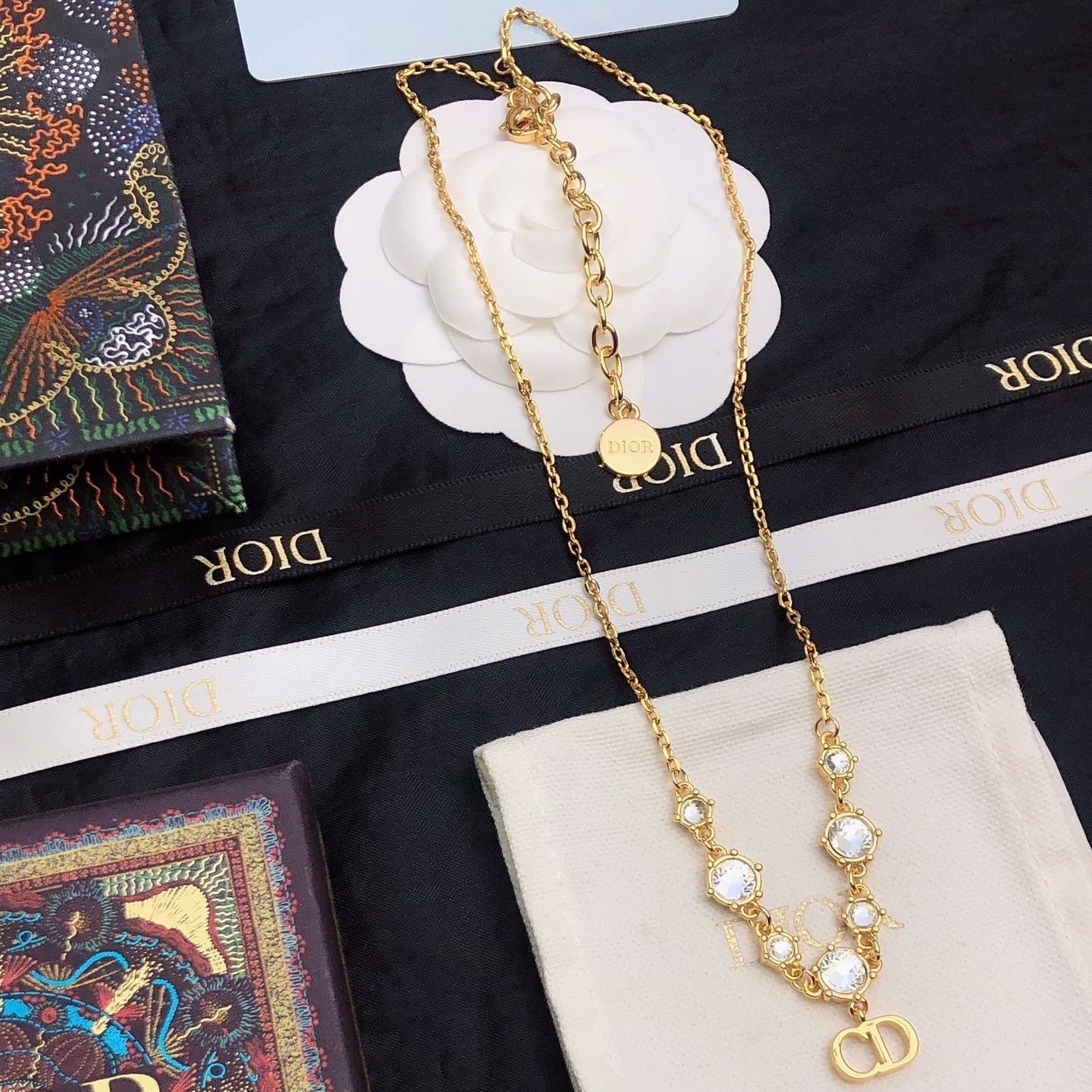 CD 26S CD Logo Crystal Station Necklace In Gold Tone Metal With White Crystal 631006