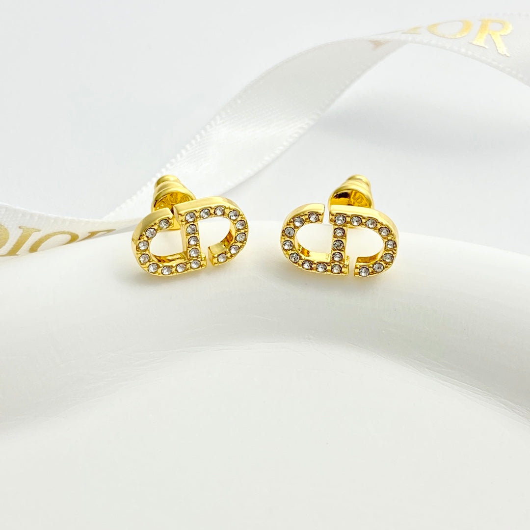 CD 26S Crystal Logo Stud Earrings In Gold Metal 633106