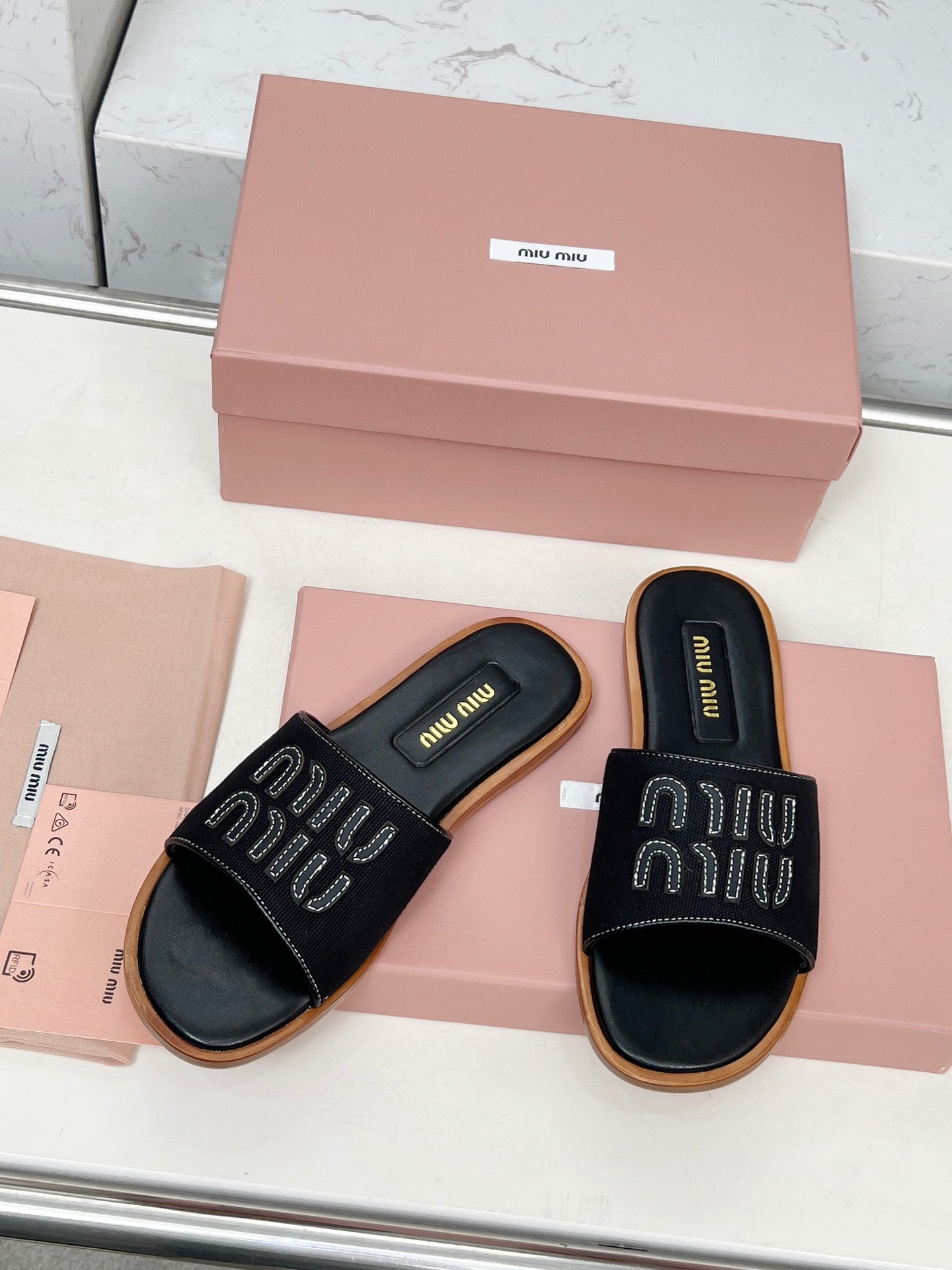 Miu Logo-Patch Slides Black Leather Canvas 935774
