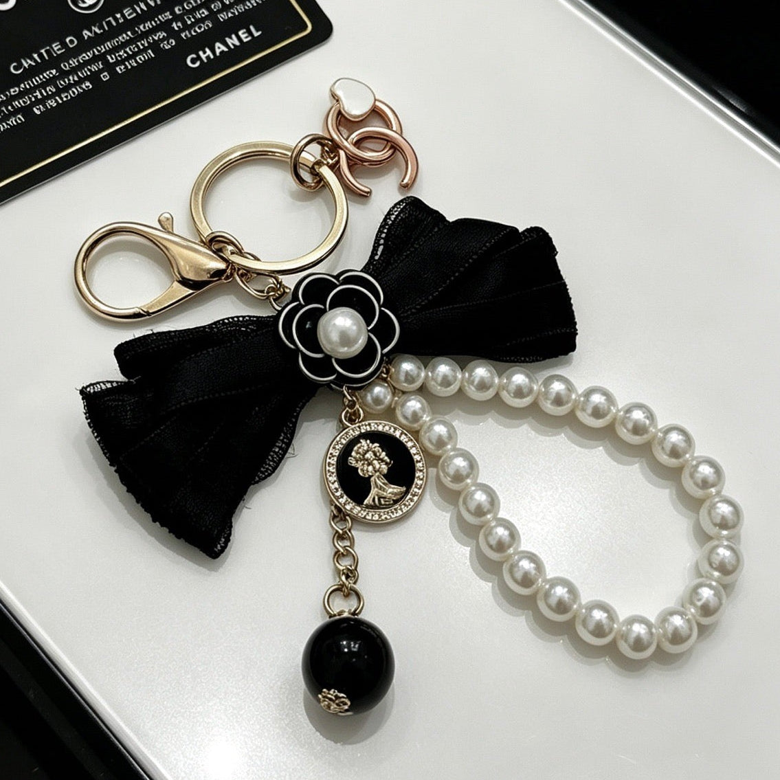 Chanel Black Bow Pearls Charm