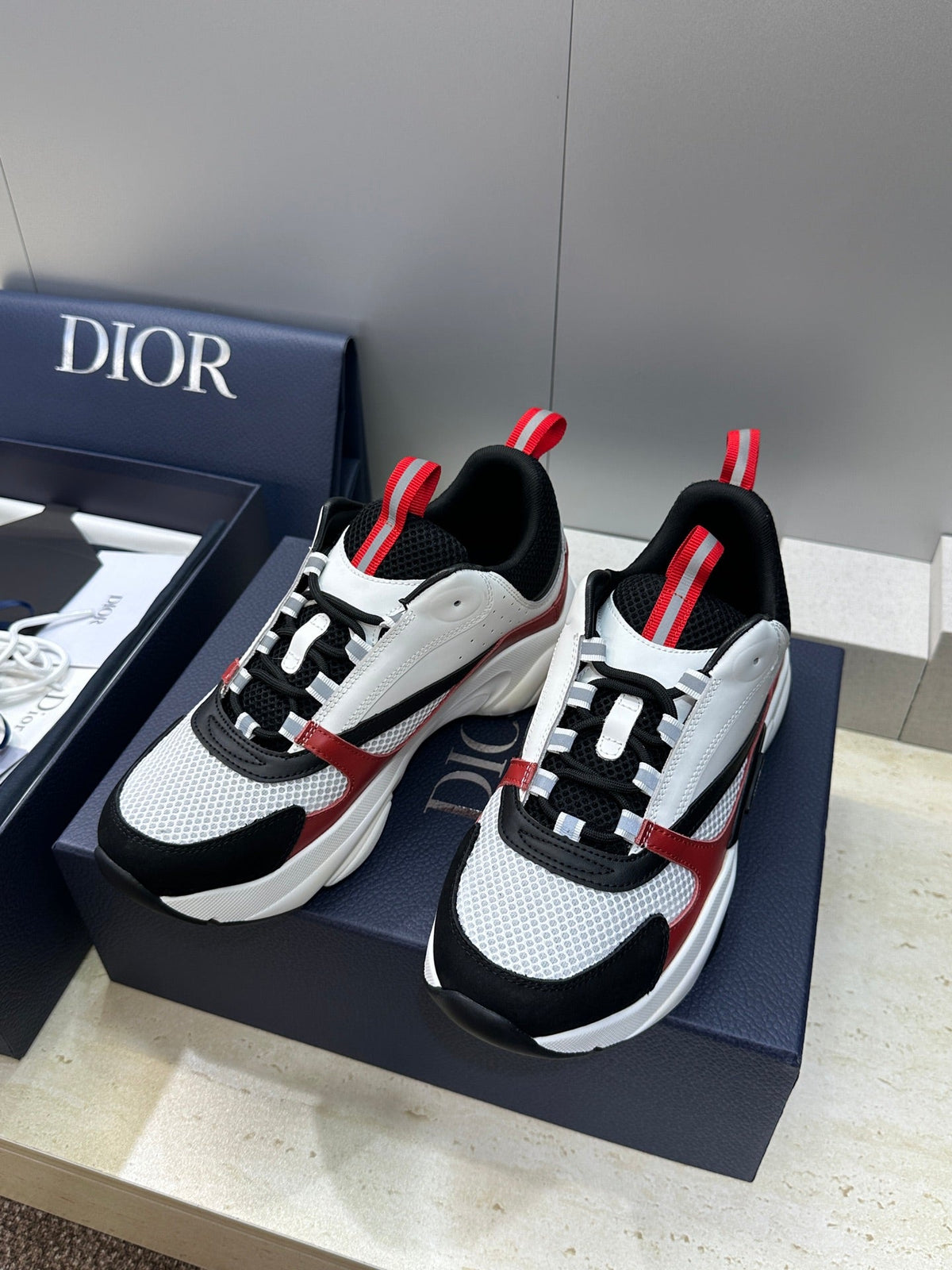 CD 26s Men B22 Sneakers White Black Red Trim 491825