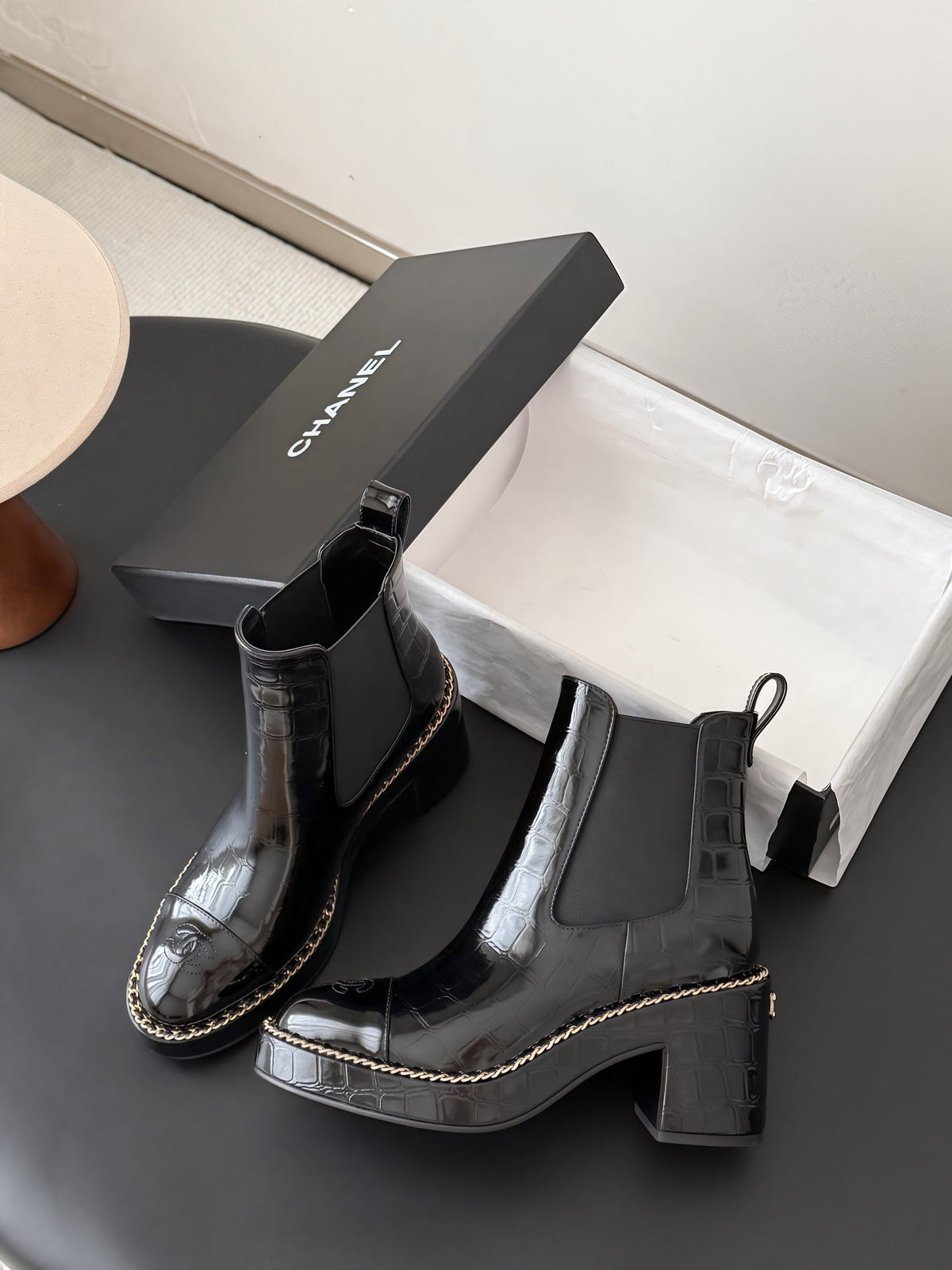 Chanel 26s Chelsea Ankle Boots 7 Cm Black Embossed Patent