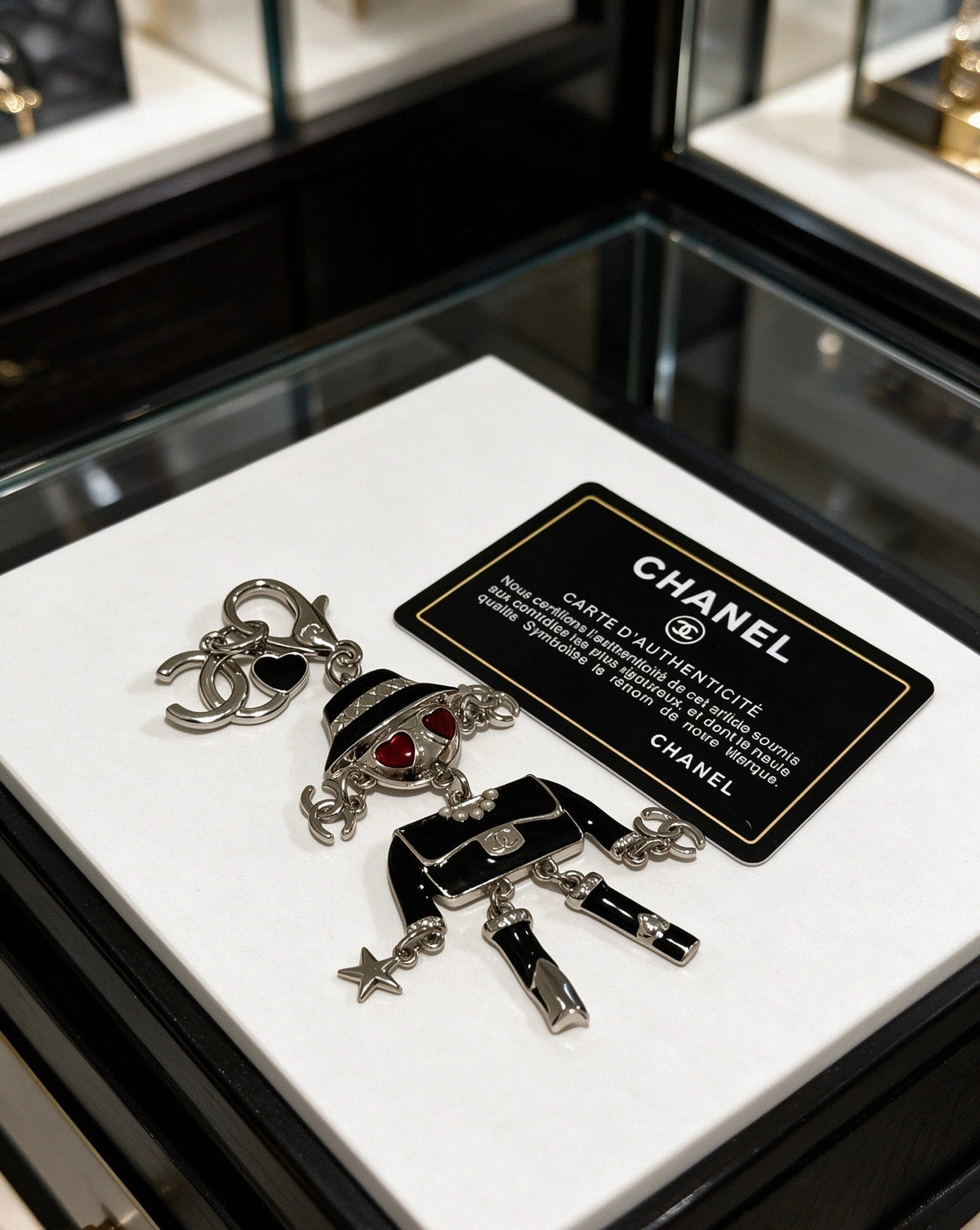 Chanel Black Silver Doll Charm