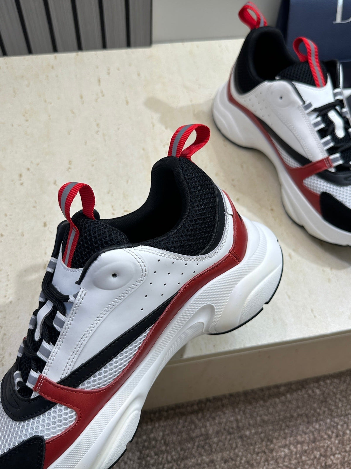 CD 26s Men B22 Sneakers White Black Red Trim 491825