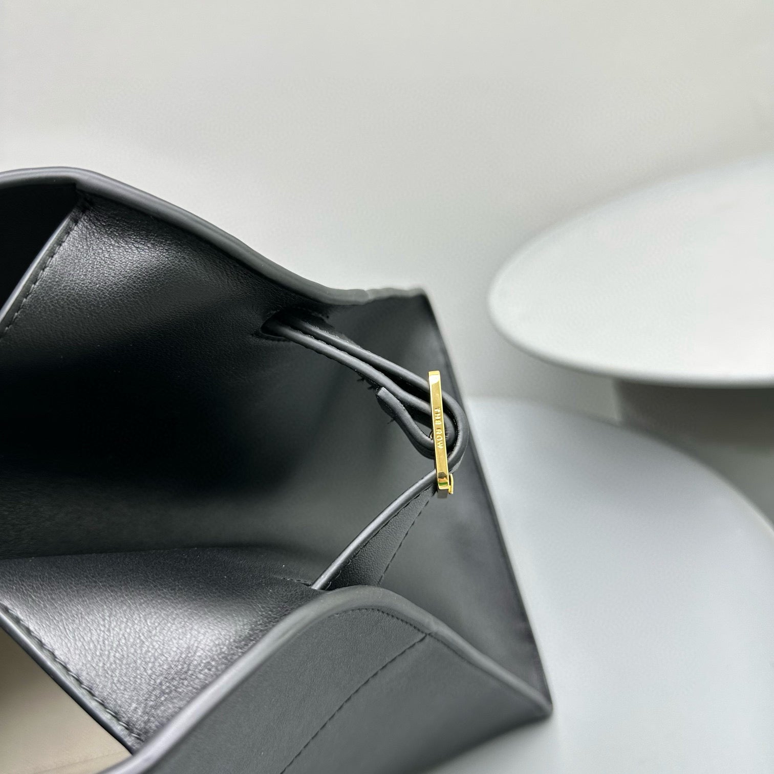 The Row Margaux 17 Black Cowhide