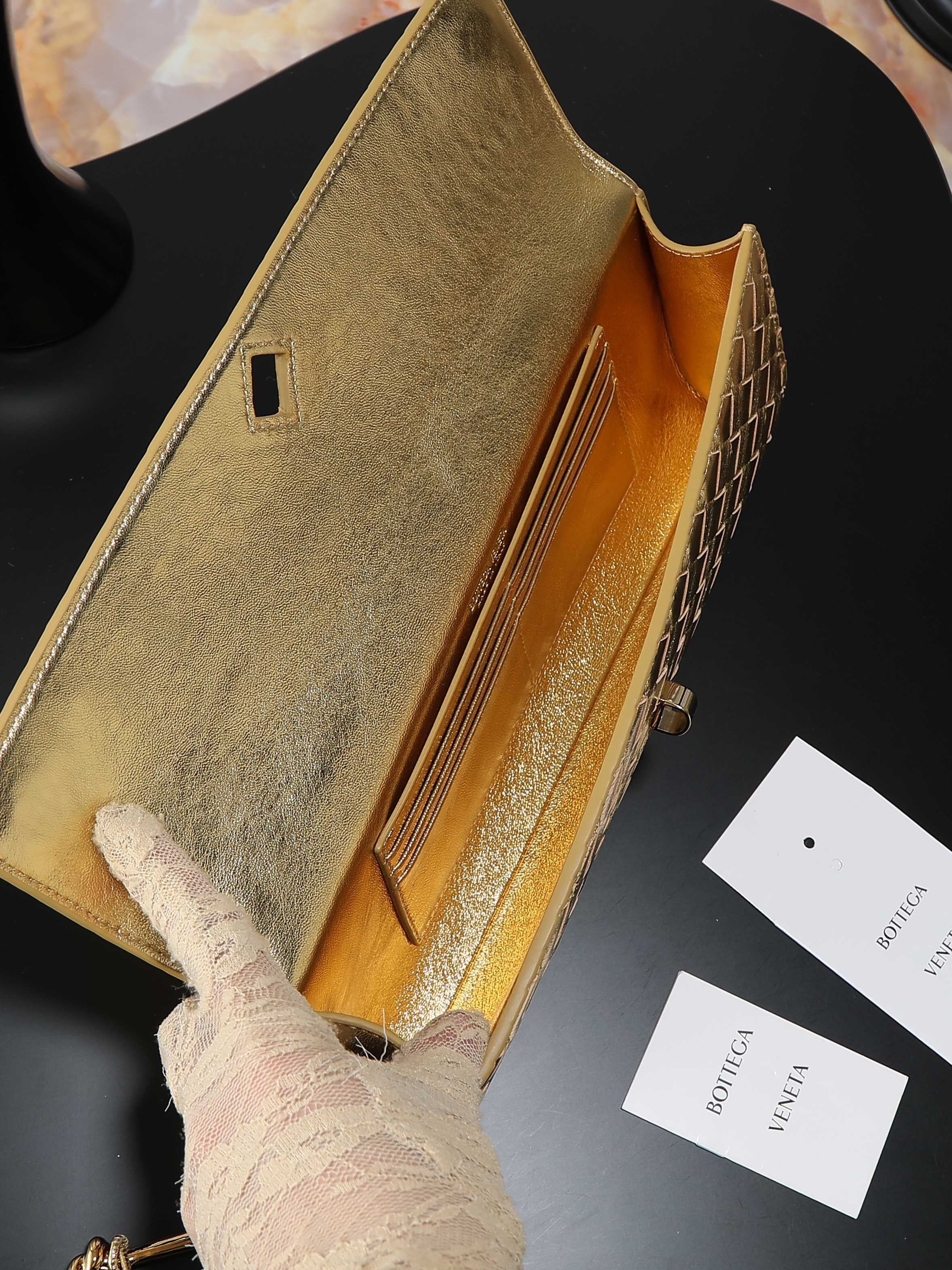 Andiamo Clutch 31cm Gold Intrecciato Leather
