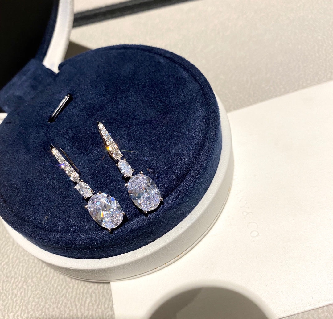 OVAL SHAPE SILVER DIAMOND EARRINGS