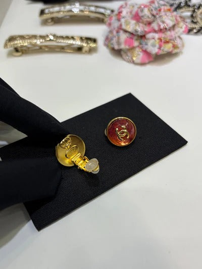 Chanel Gripoix Earrings With Gold CC Logo And Red Glass Stones