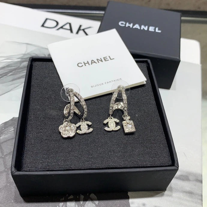 Chanel Silver Asymmetrical Earrings