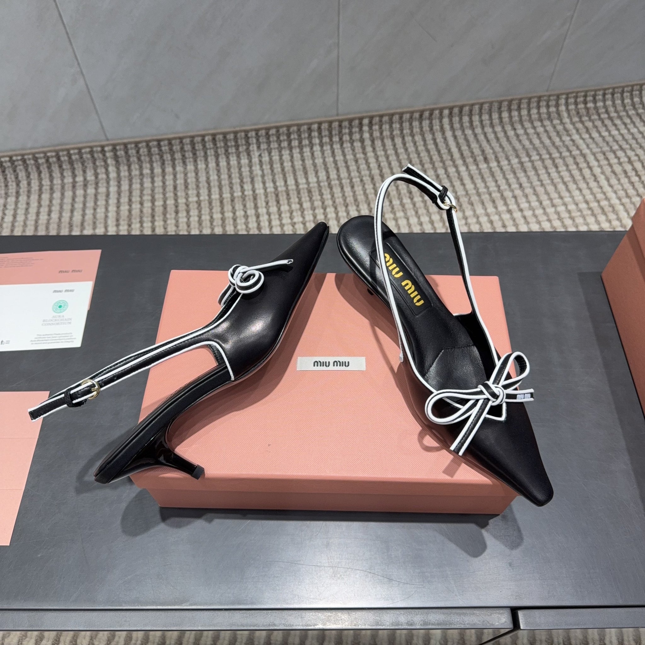 Miu 26s Slingback 55mm In Black White Calfskin With Bow