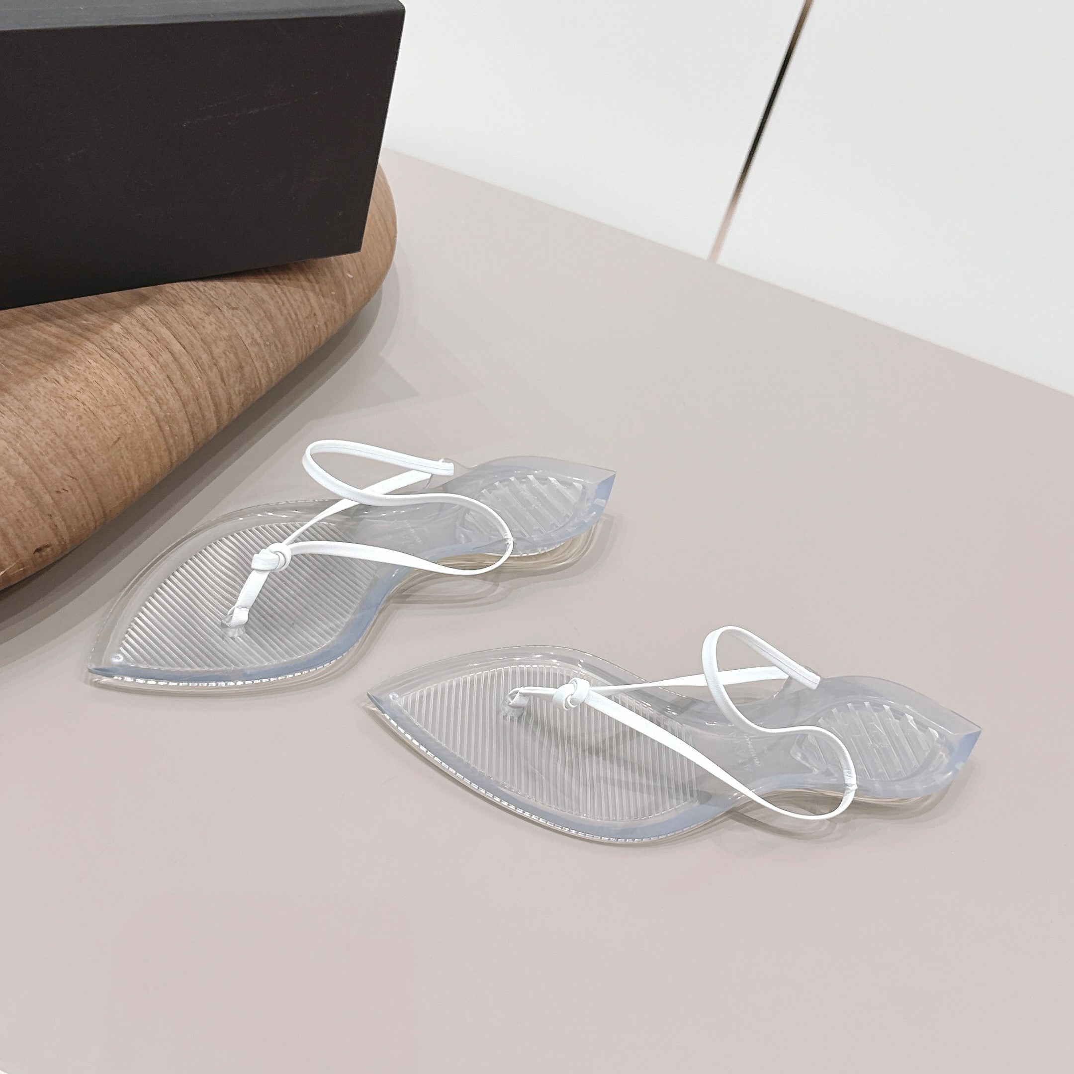 Alaïa Invisible Thong Mules White Leather 738664