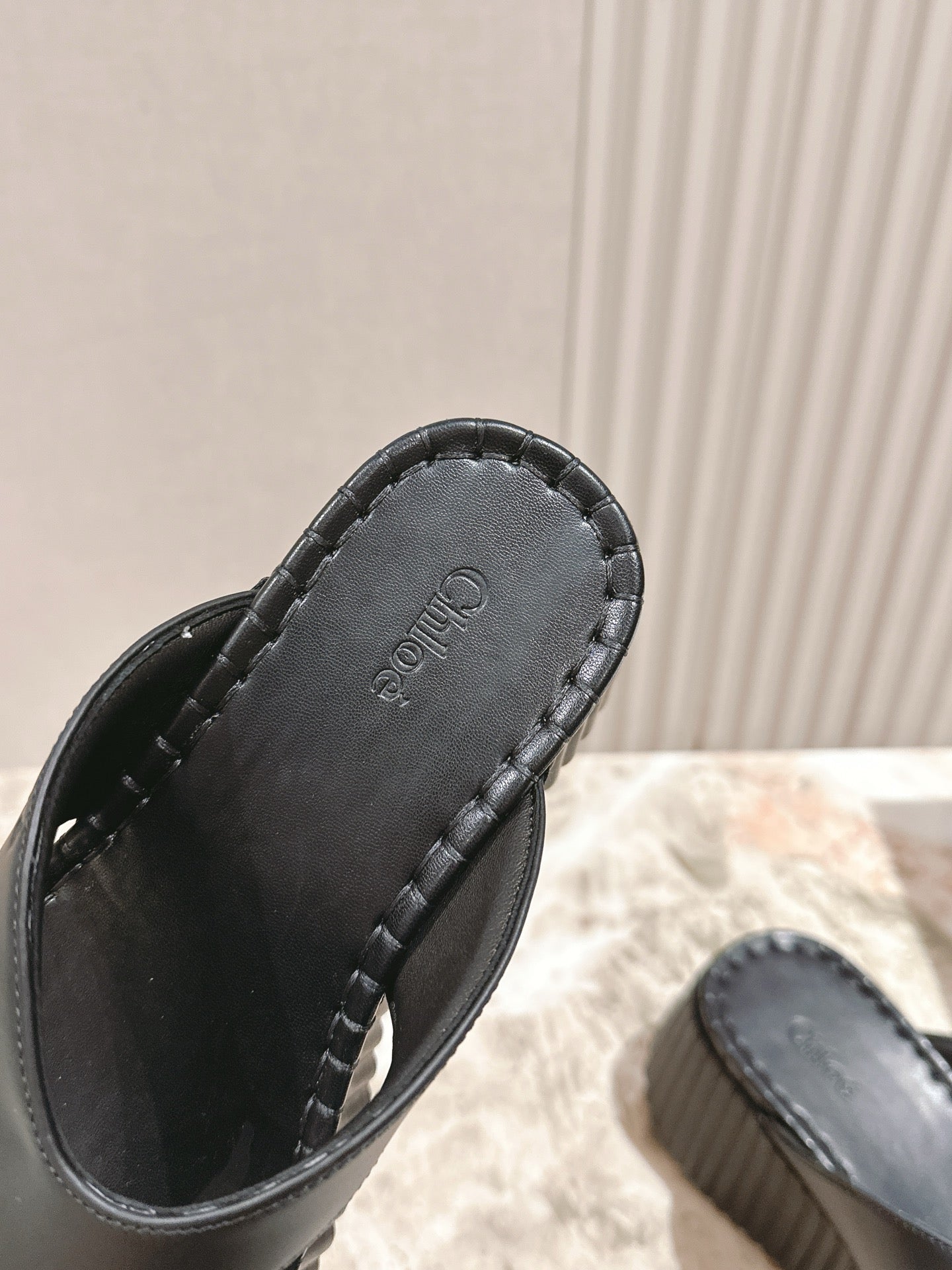 Chloé 26S Platform Flip-Flops in Black Lambskin.