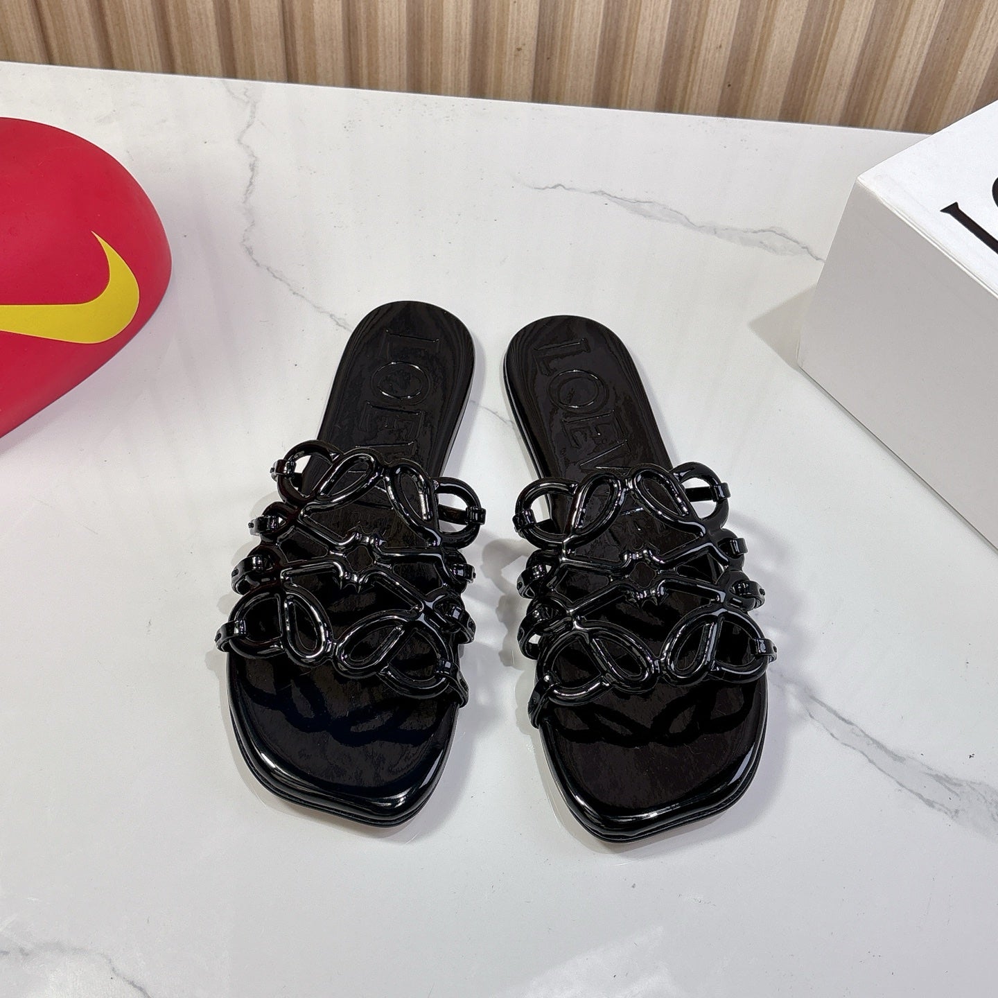 Petal Anagram Slide in Black Patent Calfskin 273744