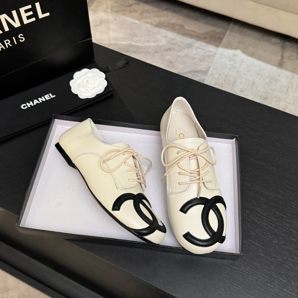 Chanel 26s Cambon Oxfords Cream Black Leather 168046