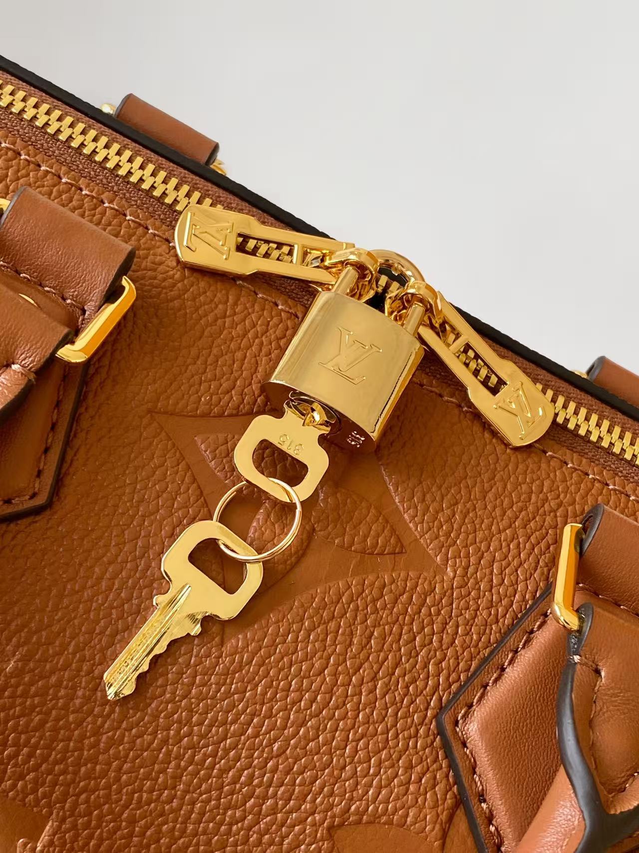 LV Bandoulière 25 Brown Monogram Empreinte Leather