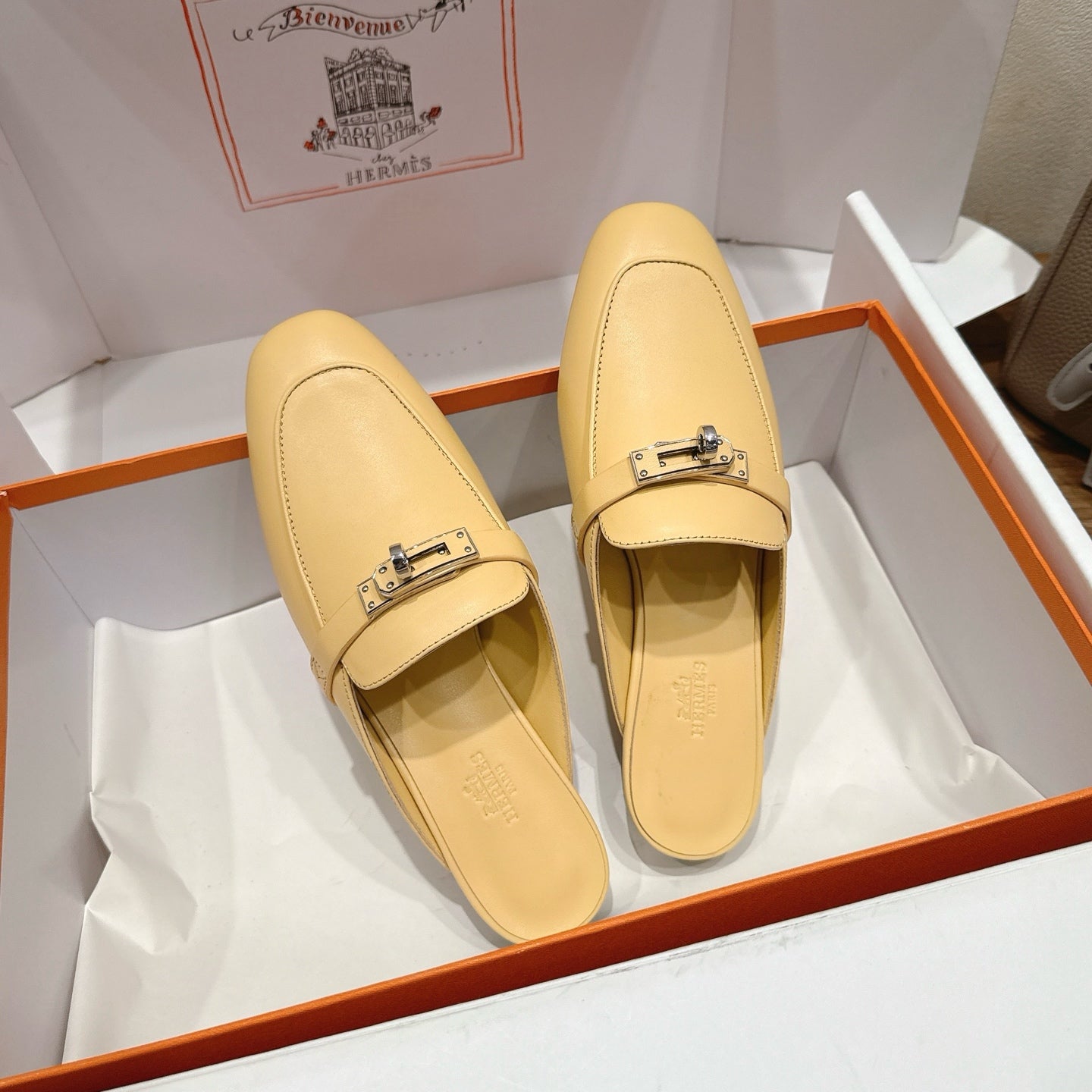 HM 26S Kelly Mule In Pale Yellow Calfskin Silver Hardware