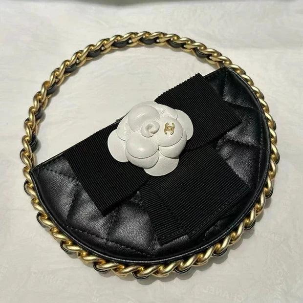 Chanel 2026 Quilted Round Camellia Mini Clutch 16cm Lambskin