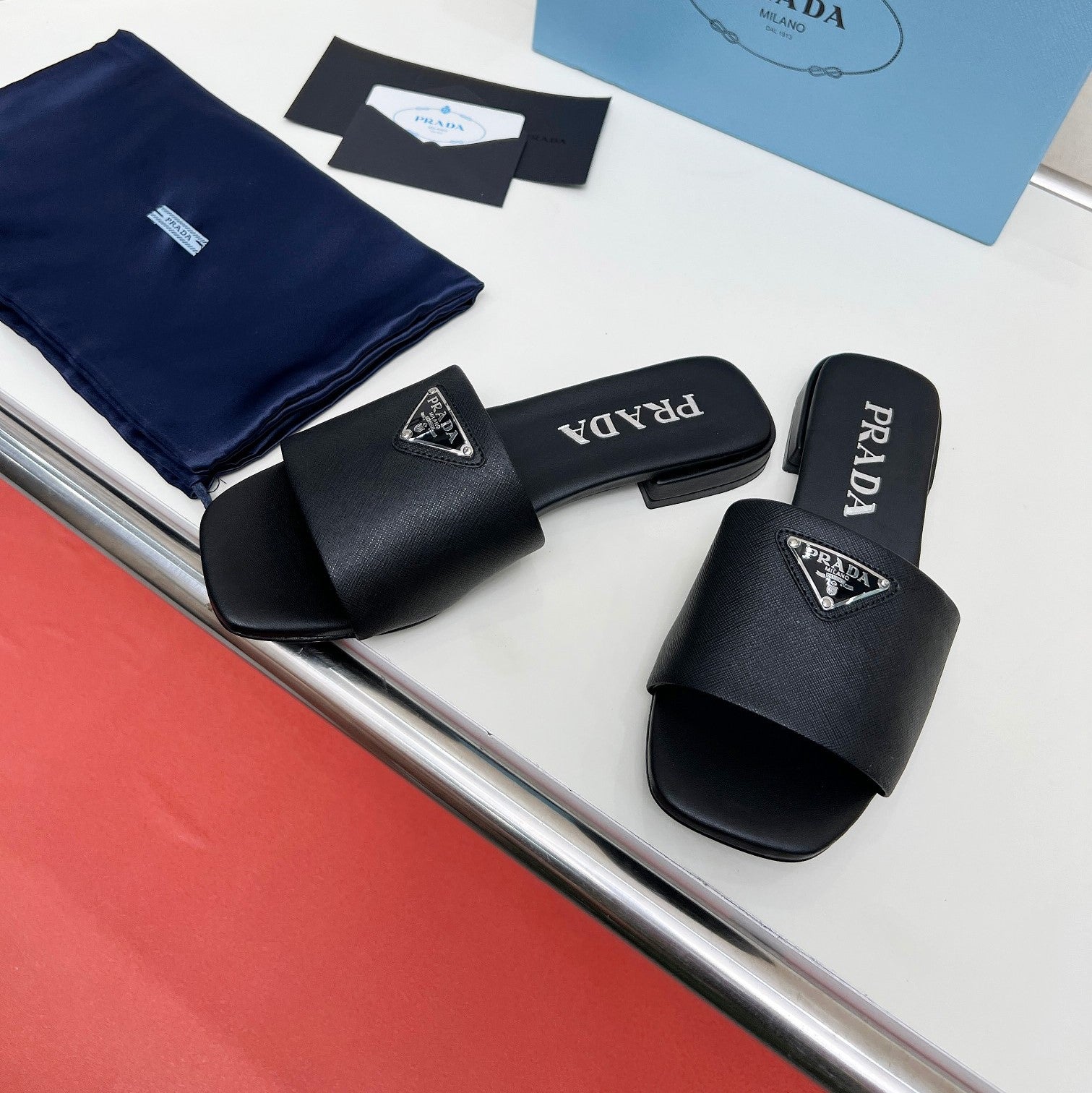 Prada 26s Saffiano Slides Black Leather 986630