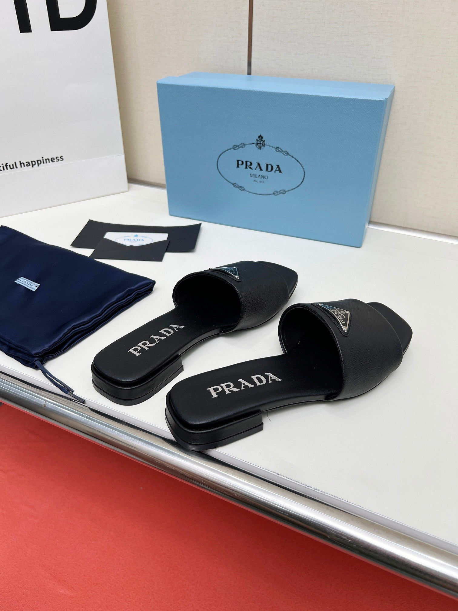 Prada 26s Saffiano Slides Black Leather 986630