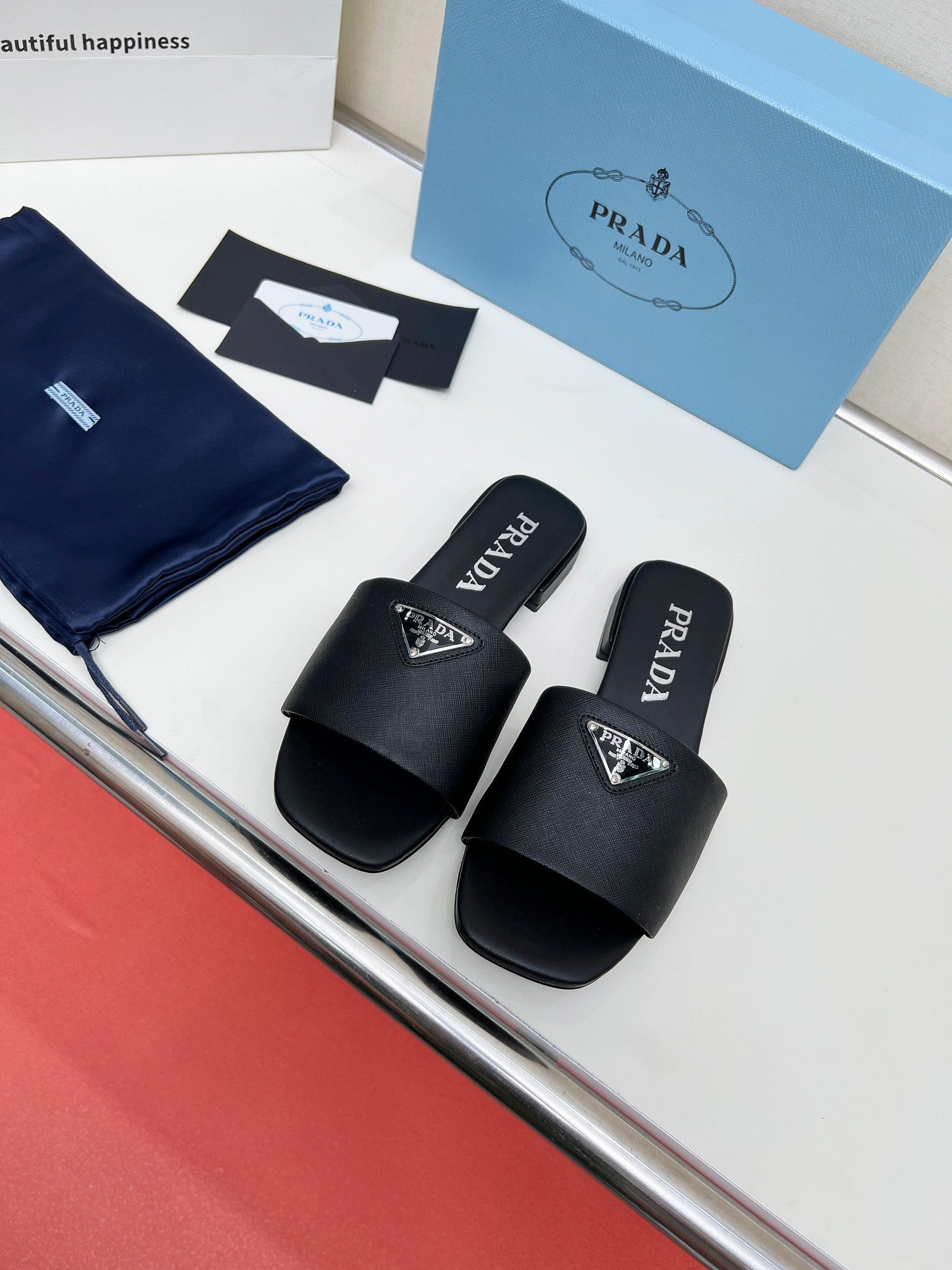 Prada 26s Saffiano Slides Black Leather 986630
