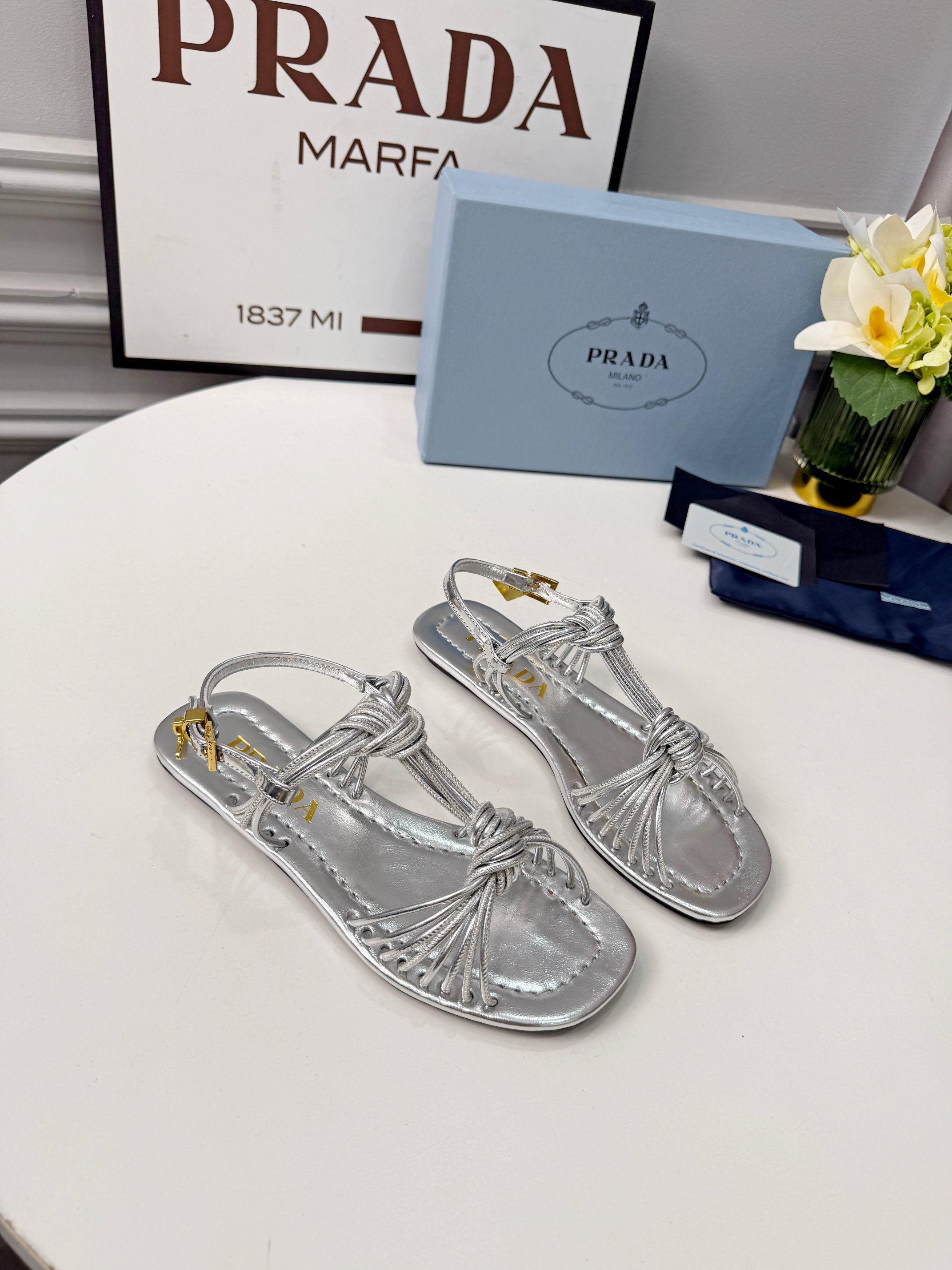 Prada 26s Knotted Metallic Leather Flat Sandals Sliver Metalic Leather 986577