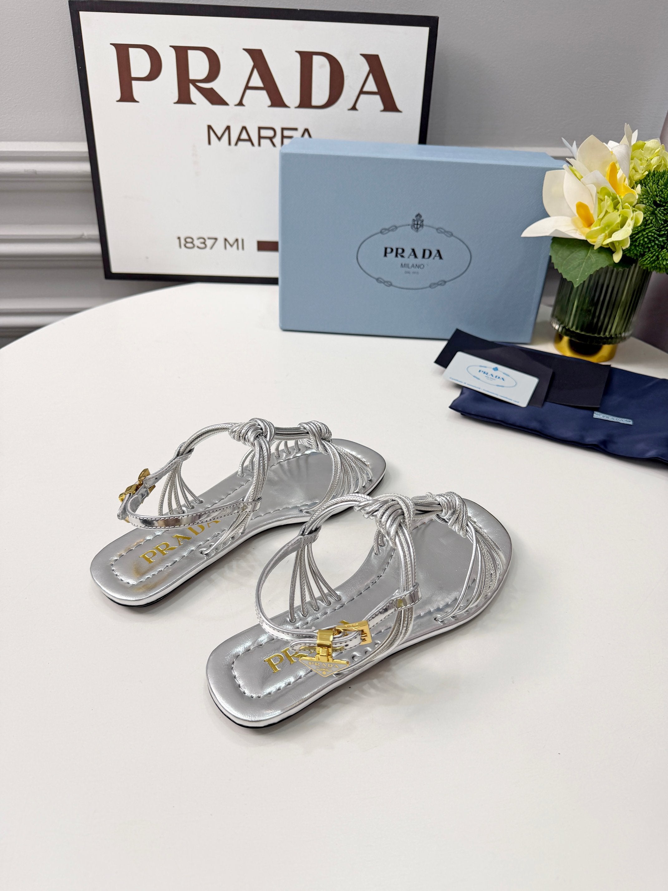 Prada 26s Knotted Metallic Leather Flat Sandals Sliver Metalic Leather 986577