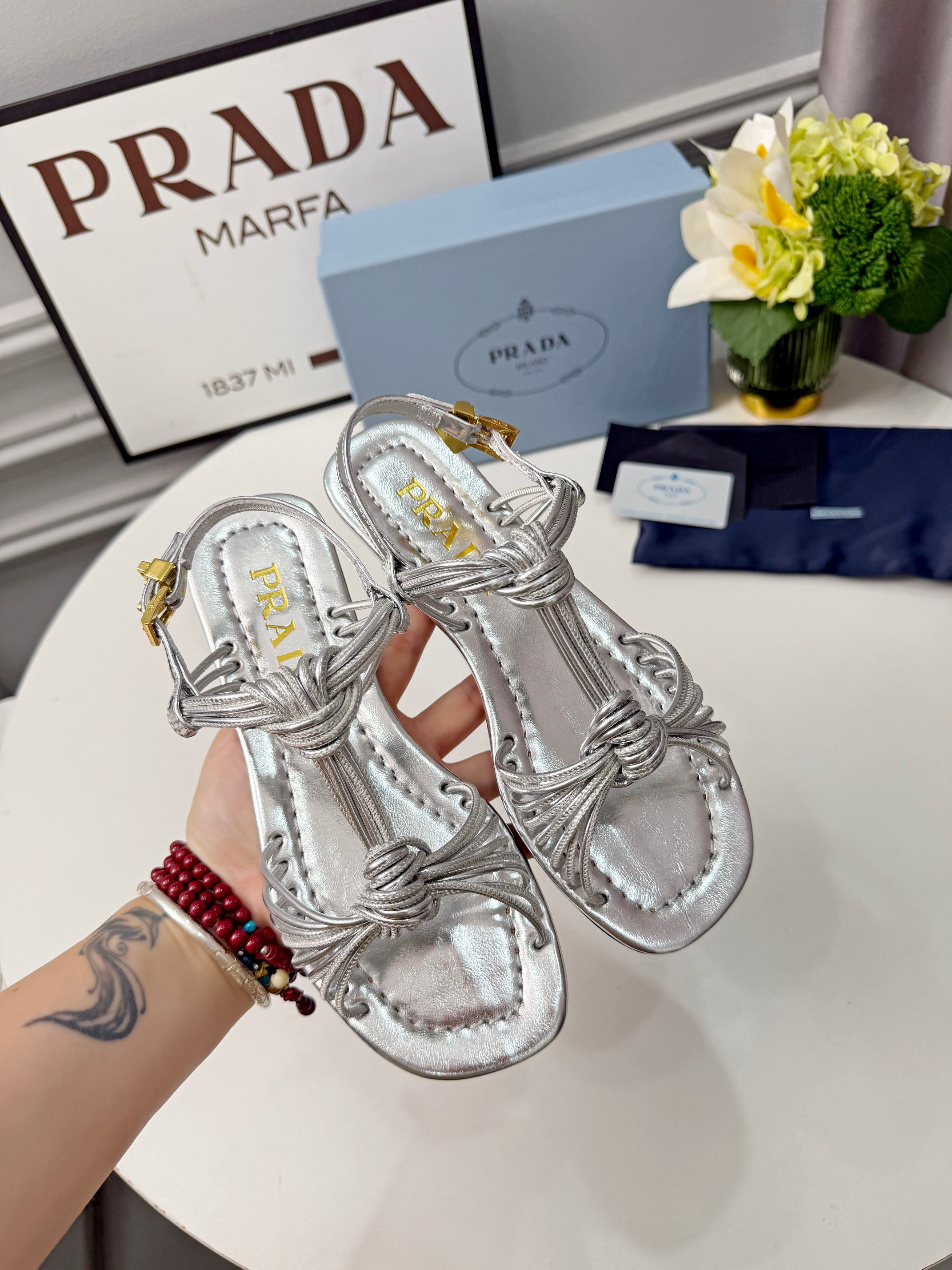 Prada 26s Knotted Metallic Leather Flat Sandals Sliver Metalic Leather 986577