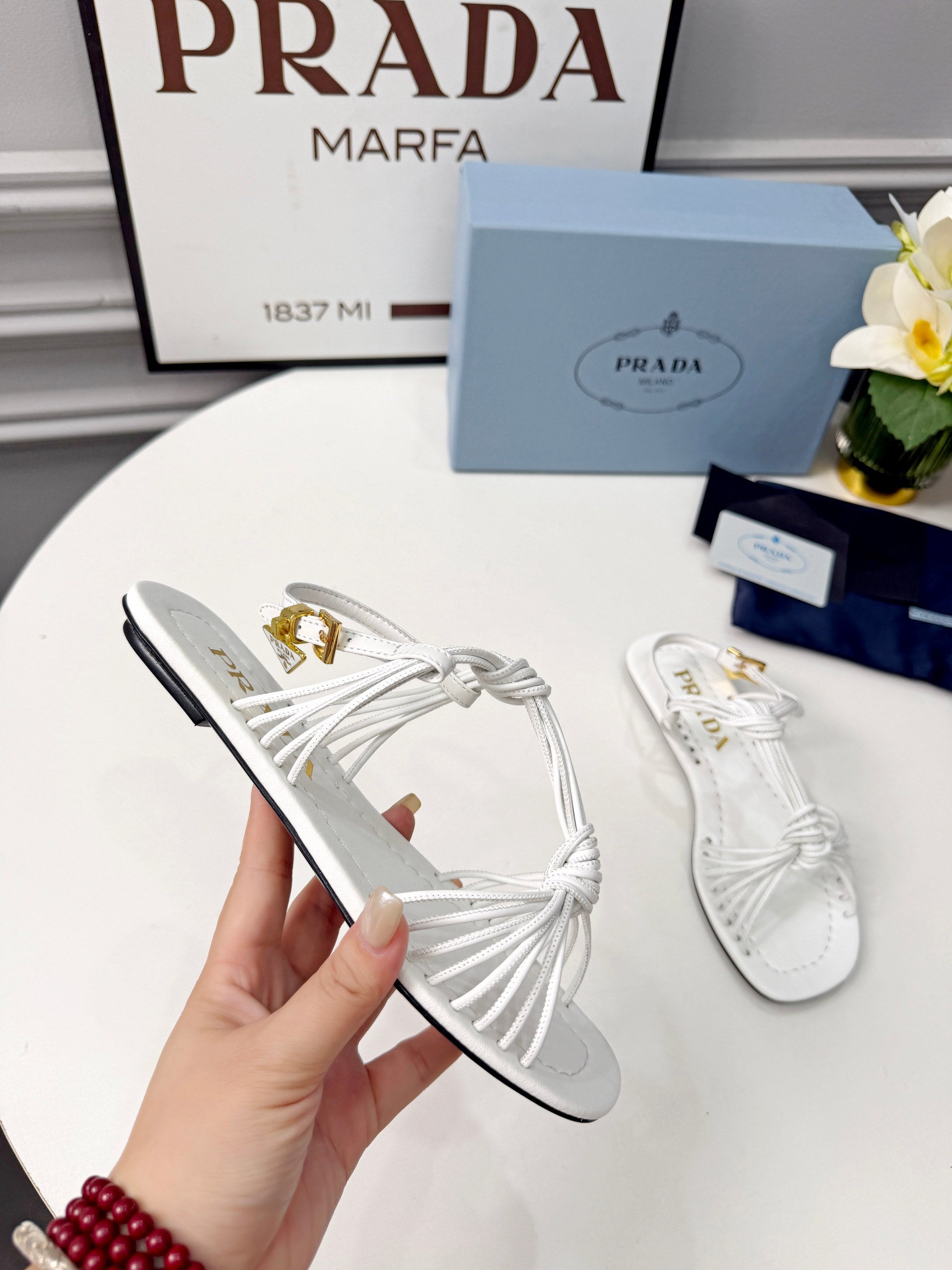 Prada 26s Knotted Metallic Leather Flat Sandals White Leather 986576