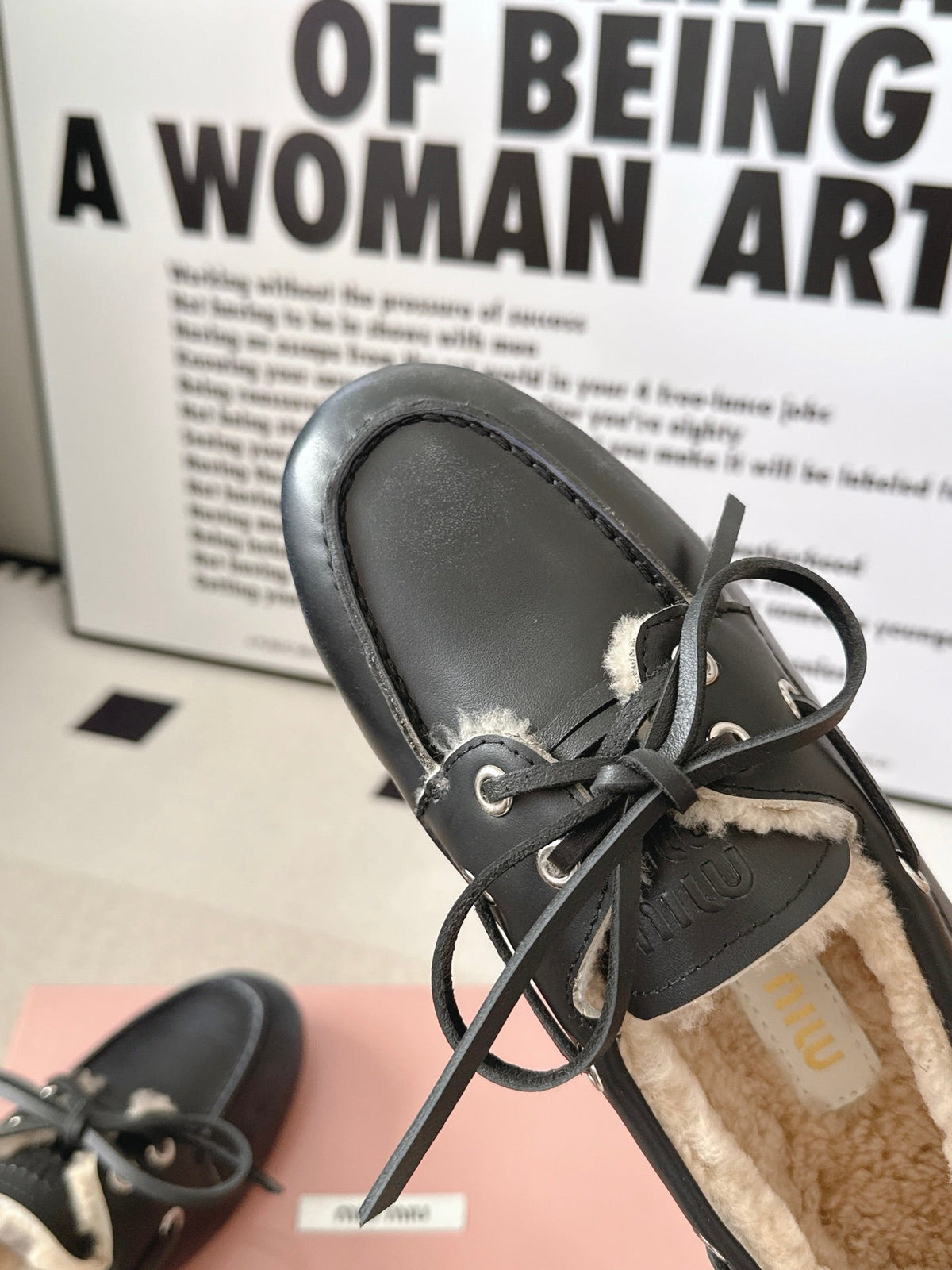 MM 26s Shearling Boat Shoes Black Leather 191938
