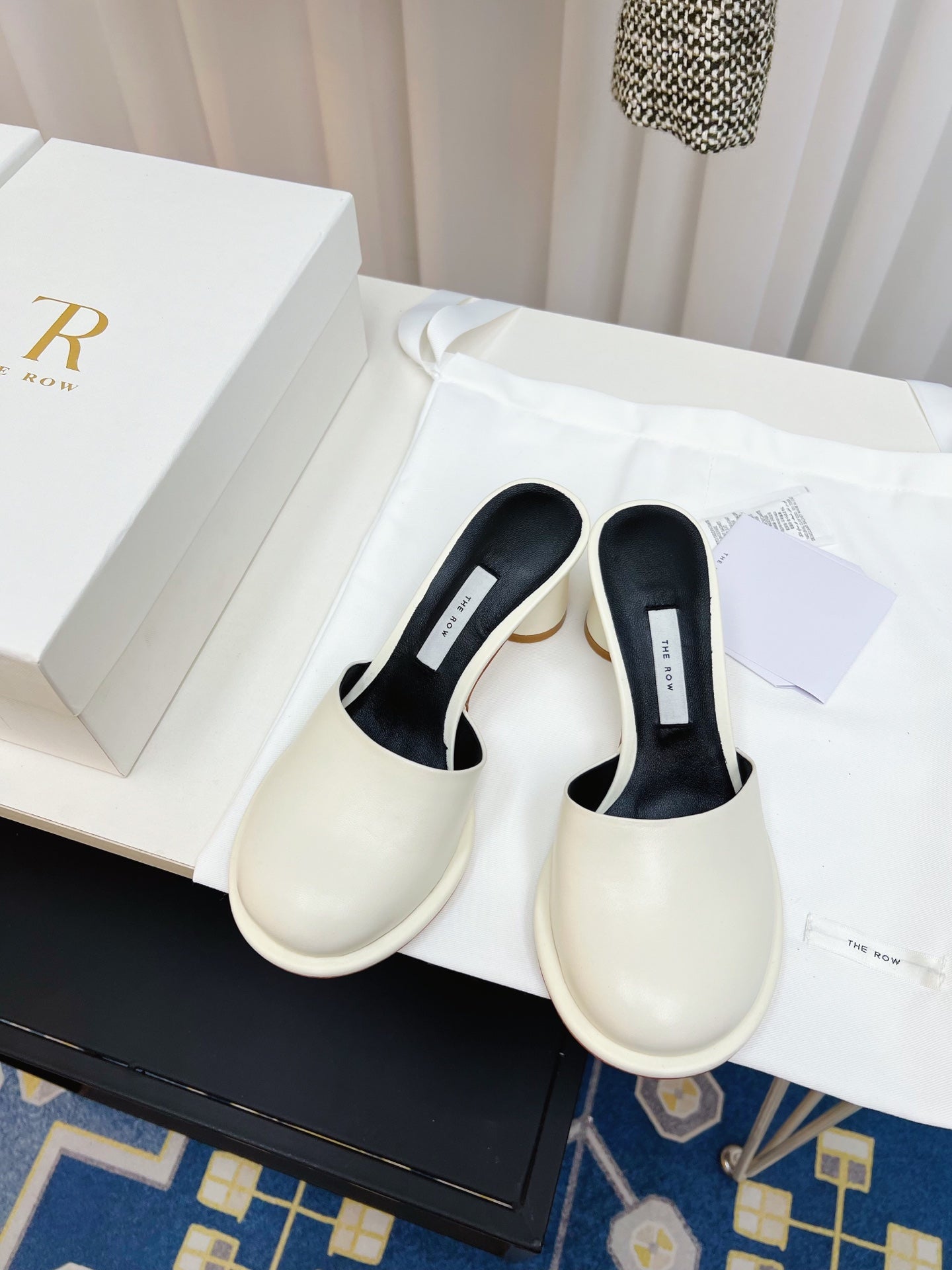 The Row  Mules 50mm White Black Sheepskin 324740