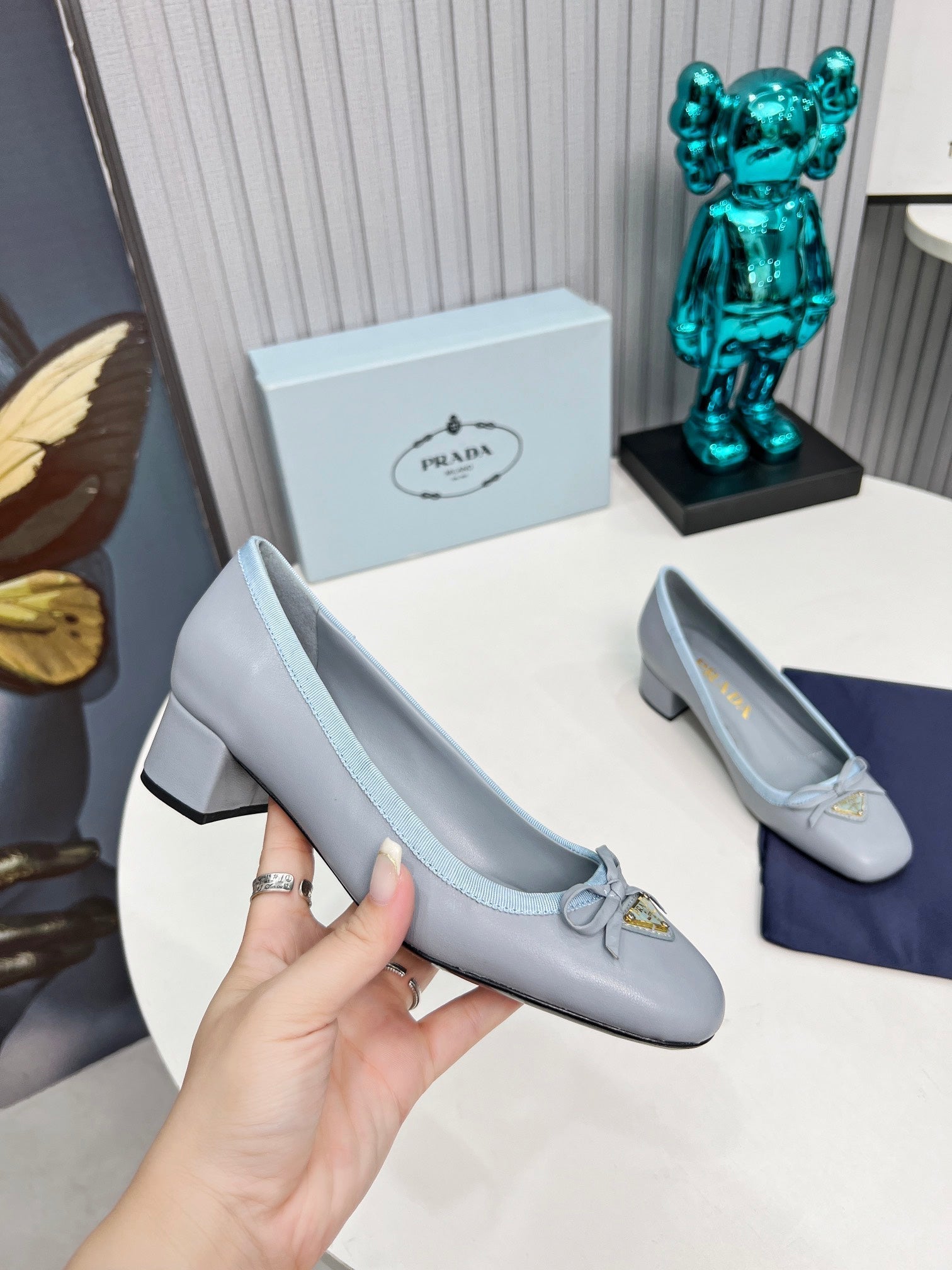 Prada 26s Round Toe Pumps Block Heel 40mm In Light Blue Calfskin With Bow