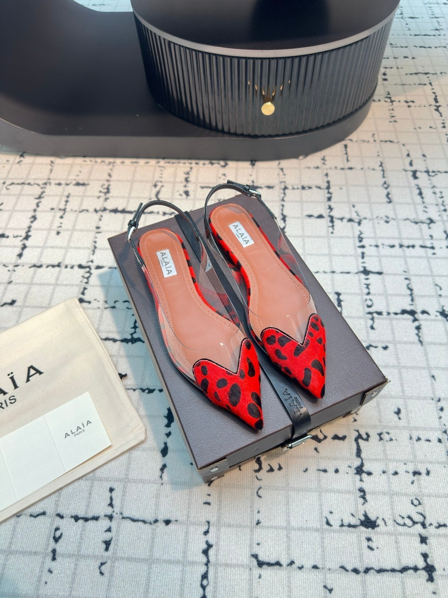 ALAIA FLAT SLINGBACK IN CHERRY RED HORSE HAIR AND FILM