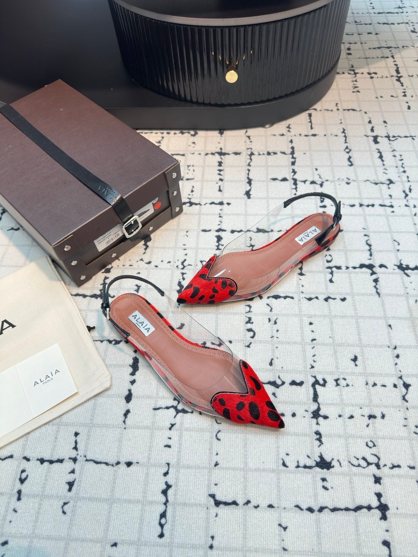 ALAIA FLAT SLINGBACK IN CHERRY RED HORSE HAIR AND FILM