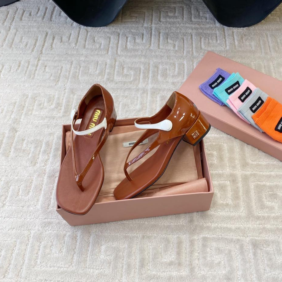 Miu High Heel Thong Sandals In Smoky Umber Glossy Sheepskin