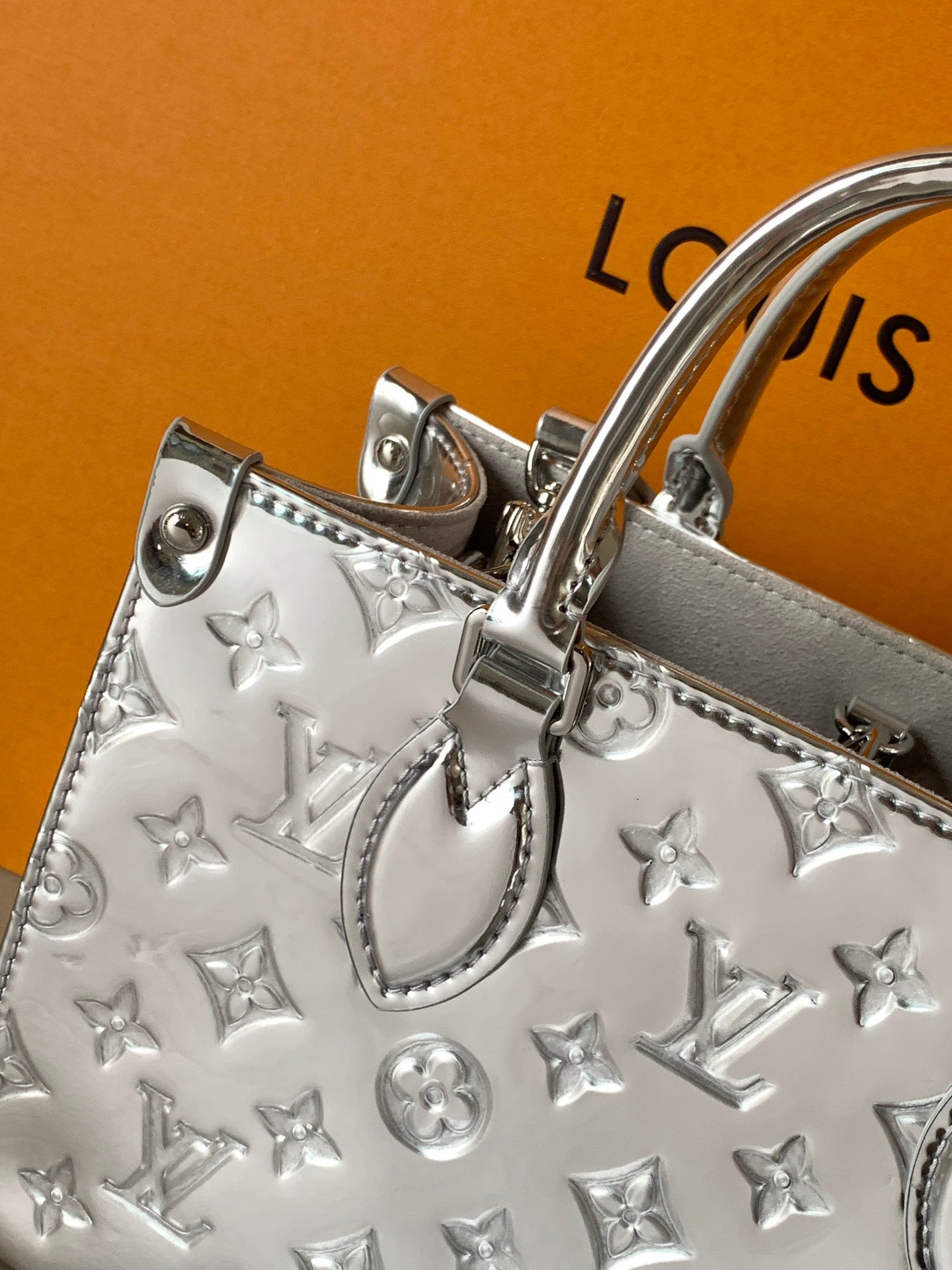 LV OnTheGo Sliver Monogram Patent Leather