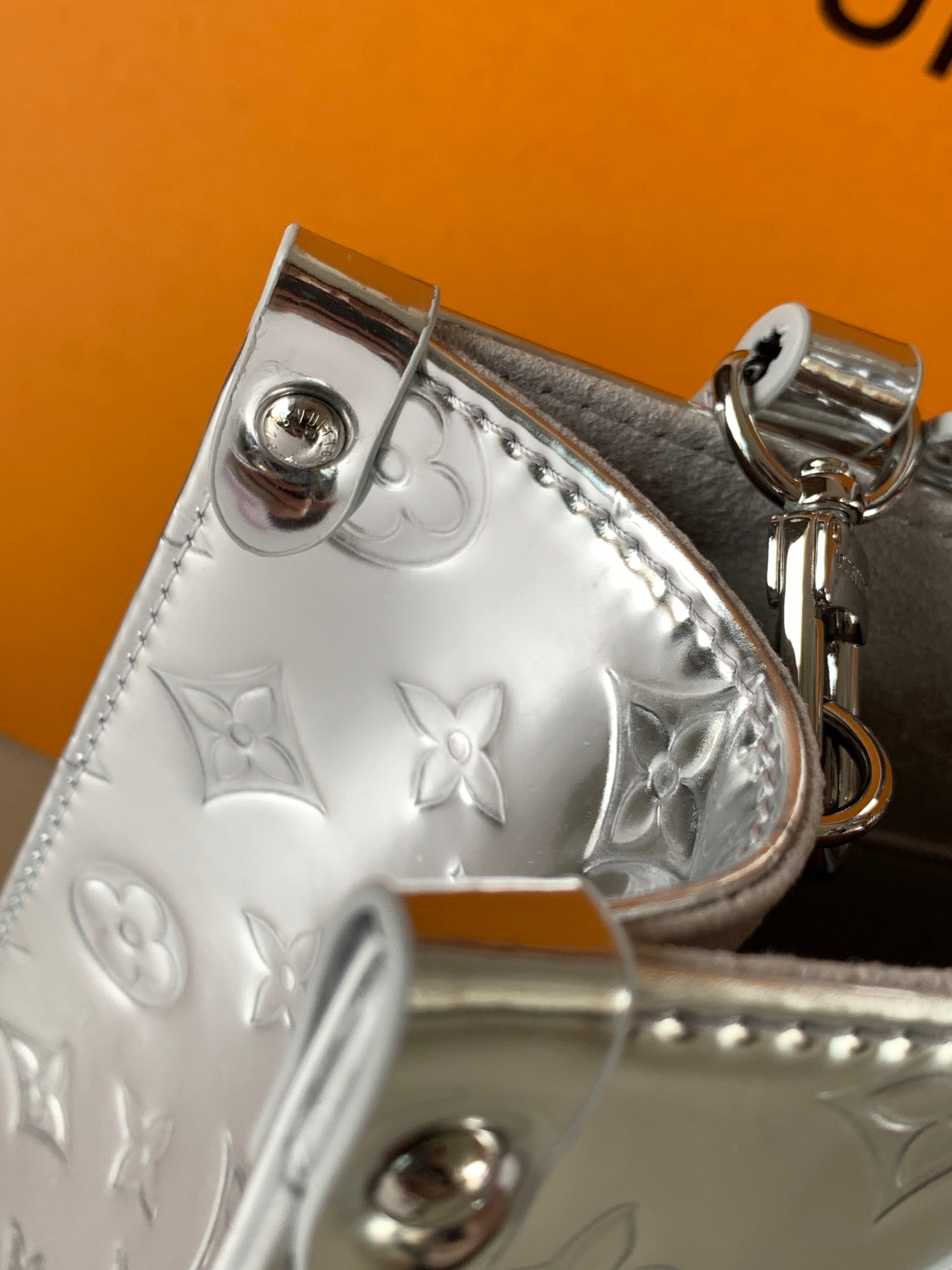 LV OnTheGo Sliver Monogram Patent Leather