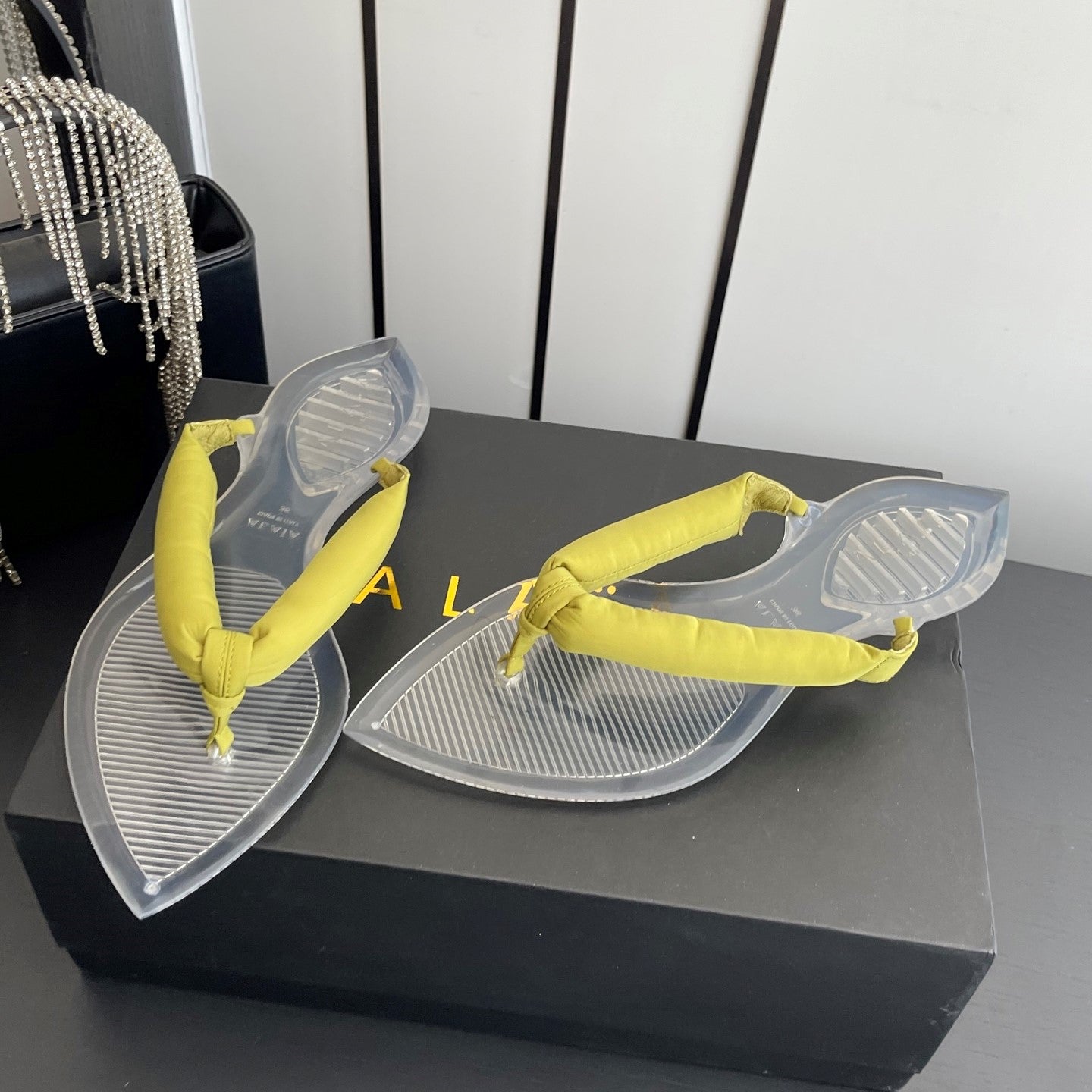 Alaïa Invisible Thong Mules Yellow Satin 740046