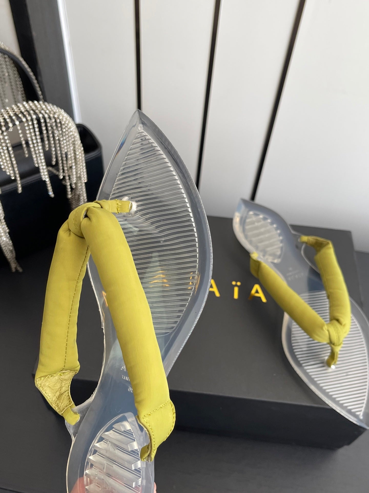 Alaïa Invisible Thong Mules Yellow Satin 740046