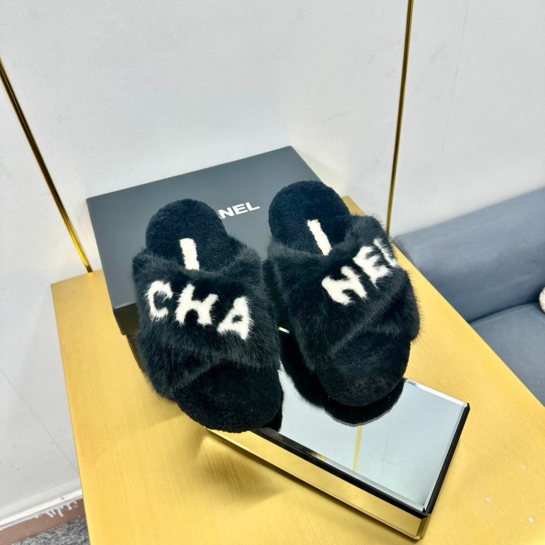 CC 26s Crisscross Sandals Black White Shearling 139990