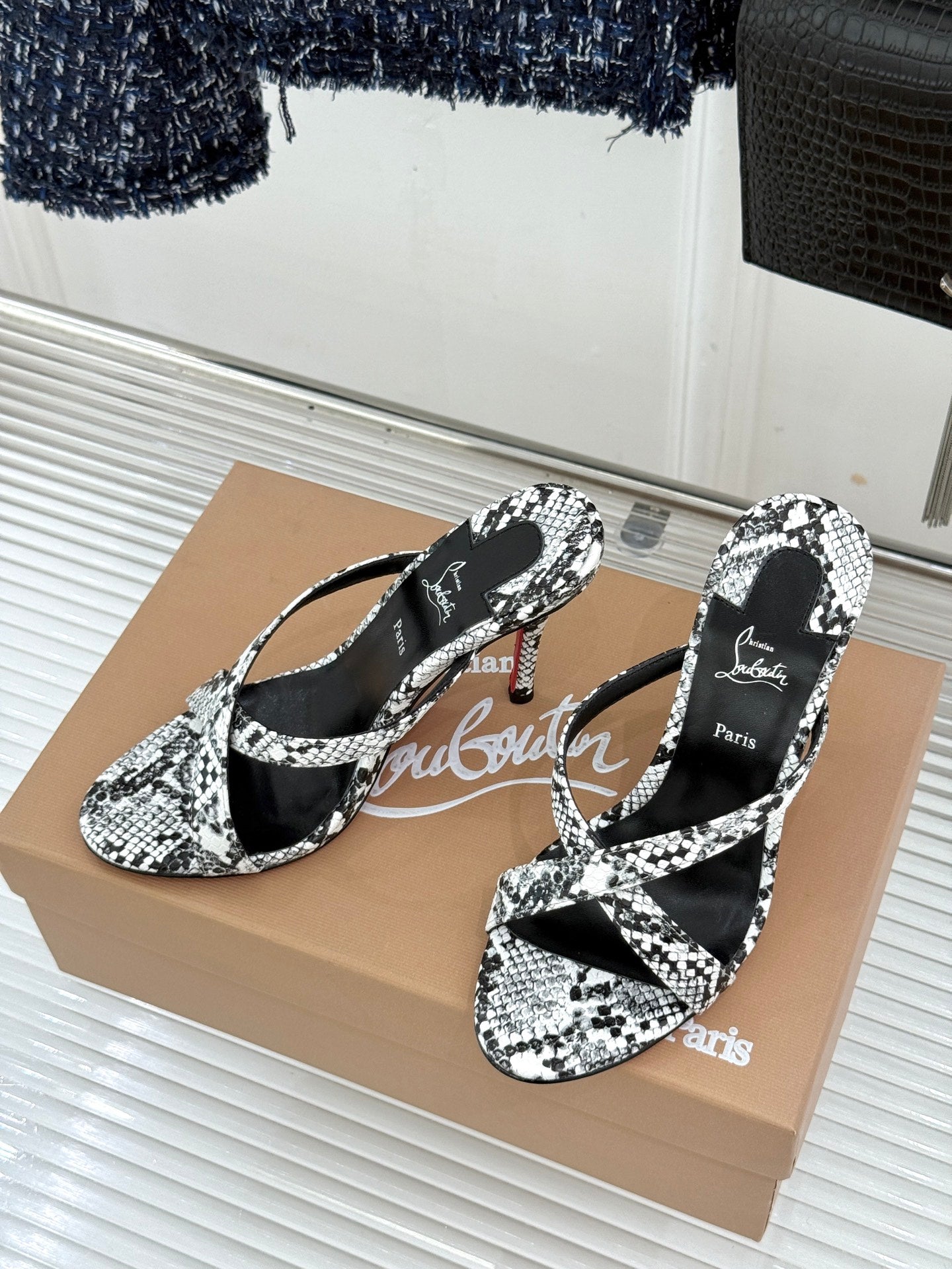 CL 26s Mulazee Cross Mules 8cm White Black Watersnake Leather 991539