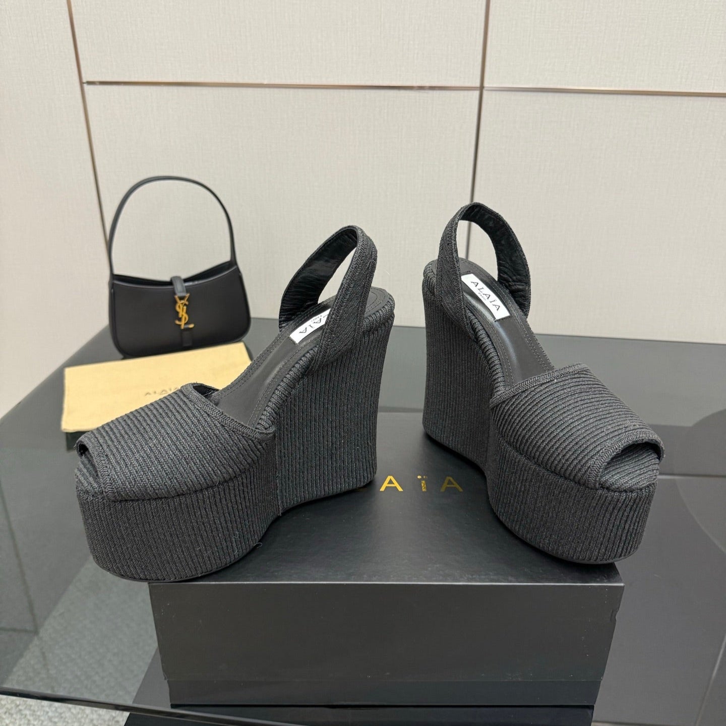 ALAIA platform sandal black sheepskin 389631