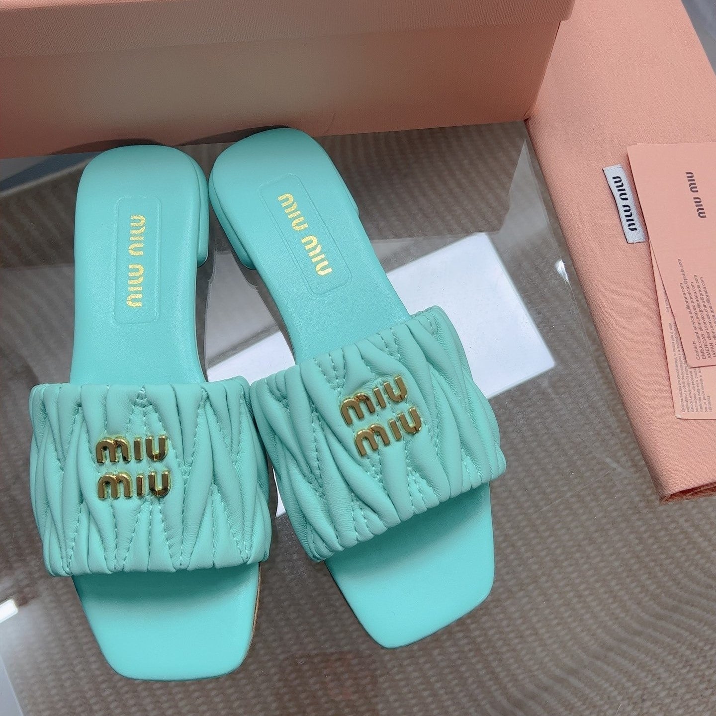 Miu Matelassé Slides Light Blue Leather 739553