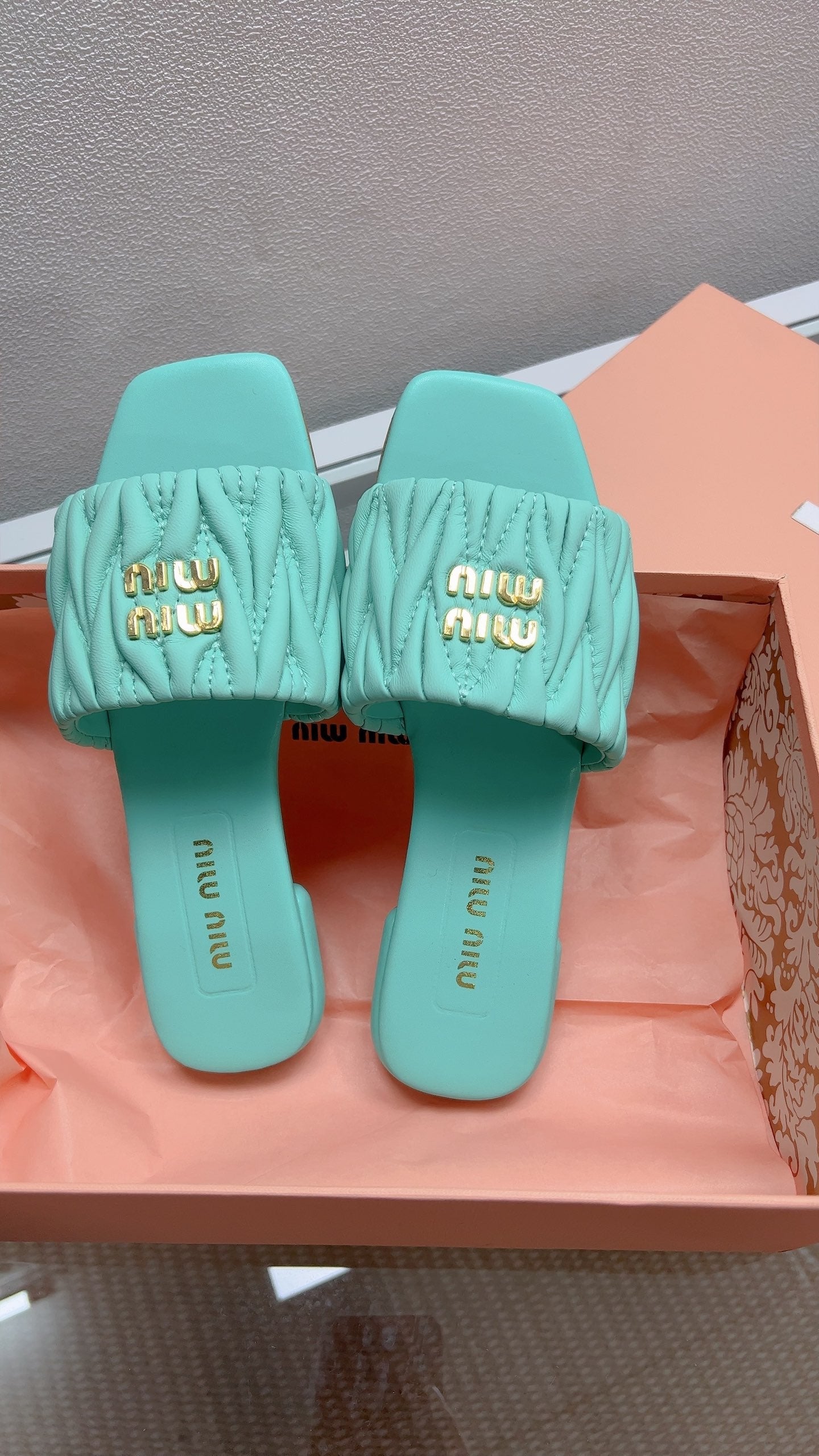 Miu Matelassé Slides Light Blue Leather 739553