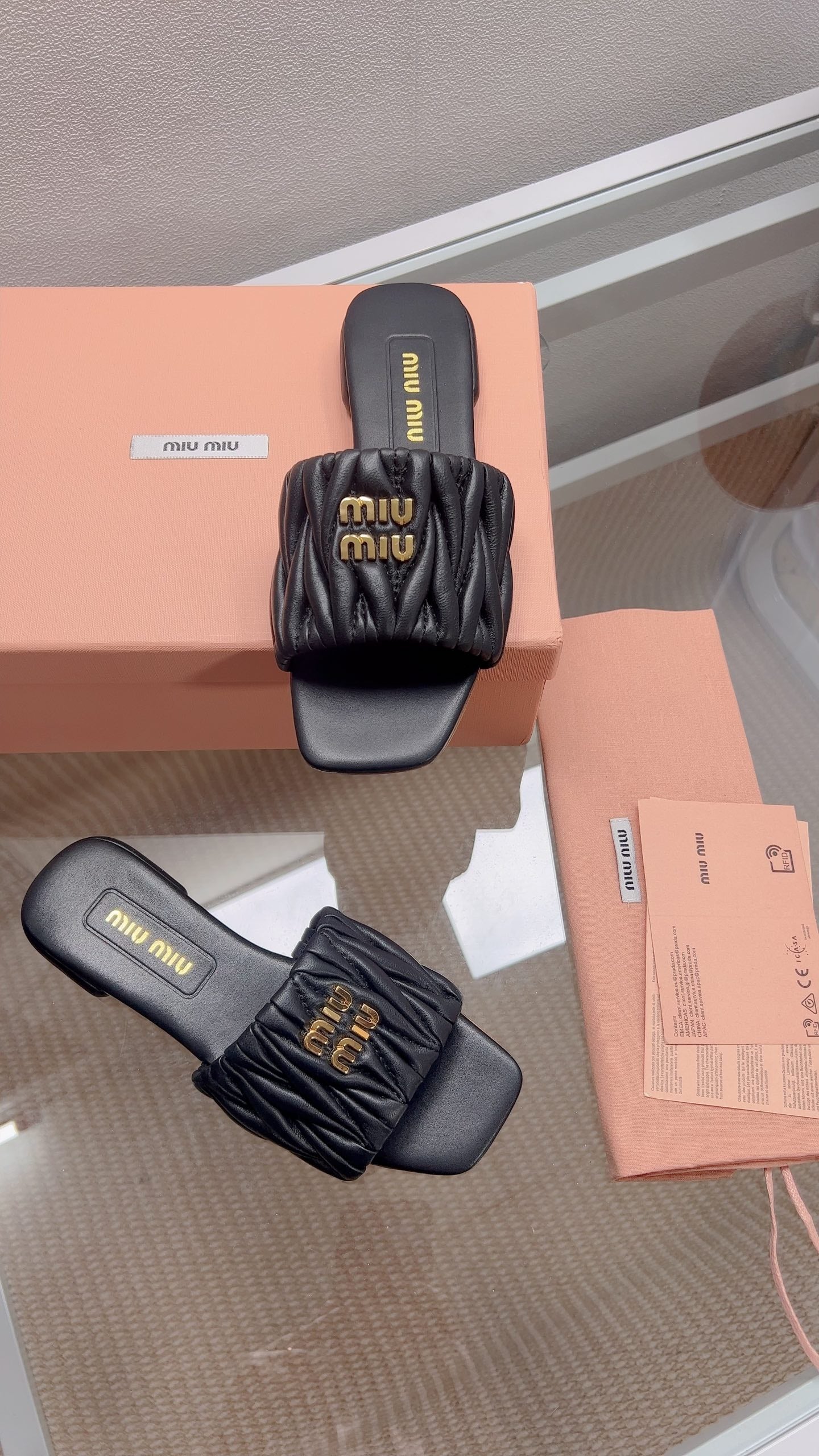 Miu Matelassé Slides Black Leather 739554