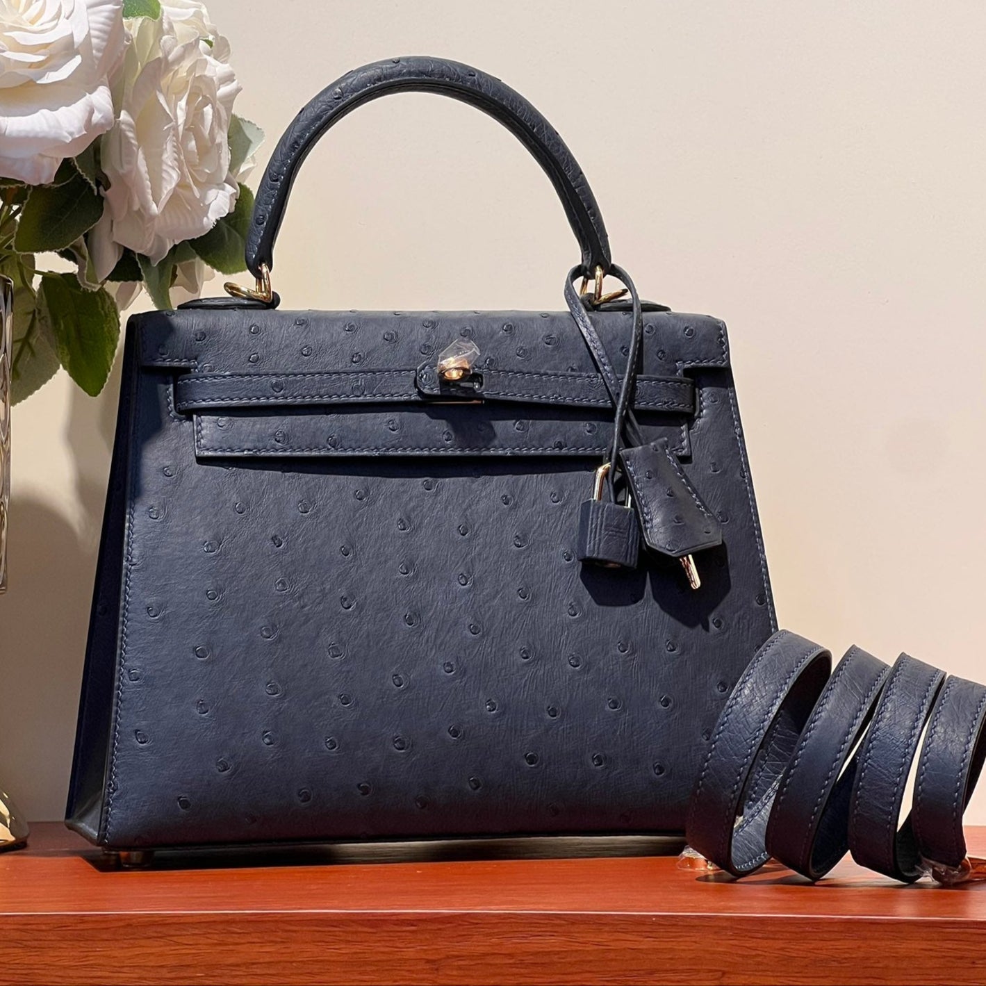 KELLY SELLIER 25 BAG IN PRUSSIAN BLUE OSTRICH LEATHER WITH GOLD HARDWARE (MADE - TO - ODER)