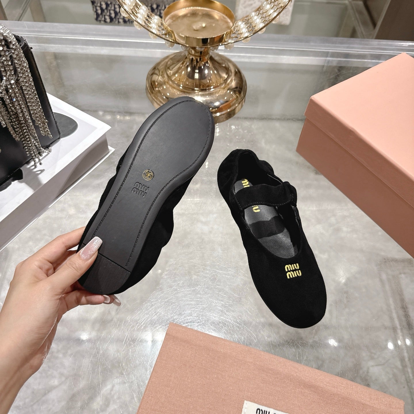 Miu 26s Mary Jane Flats In Black Suede Elastic Strap
