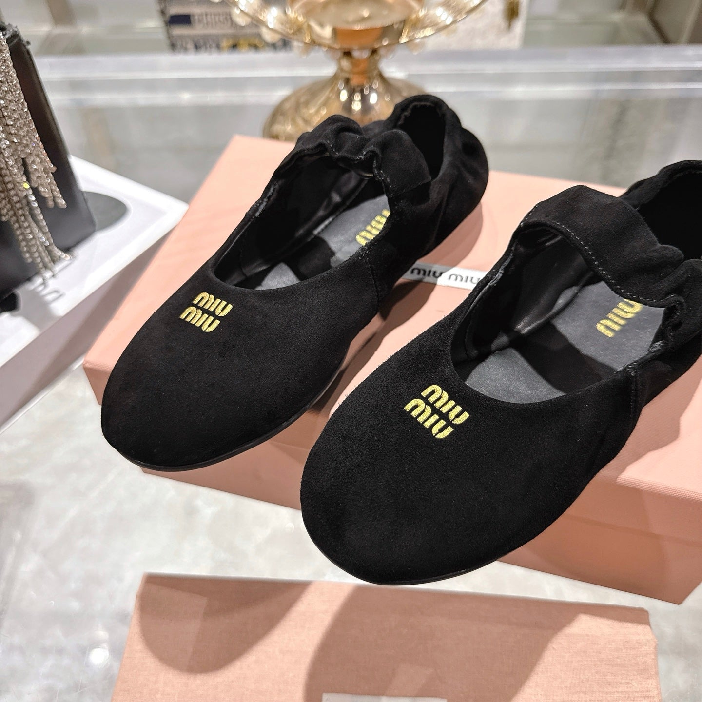 Miu 26s Mary Jane Flats In Black Suede Elastic Strap